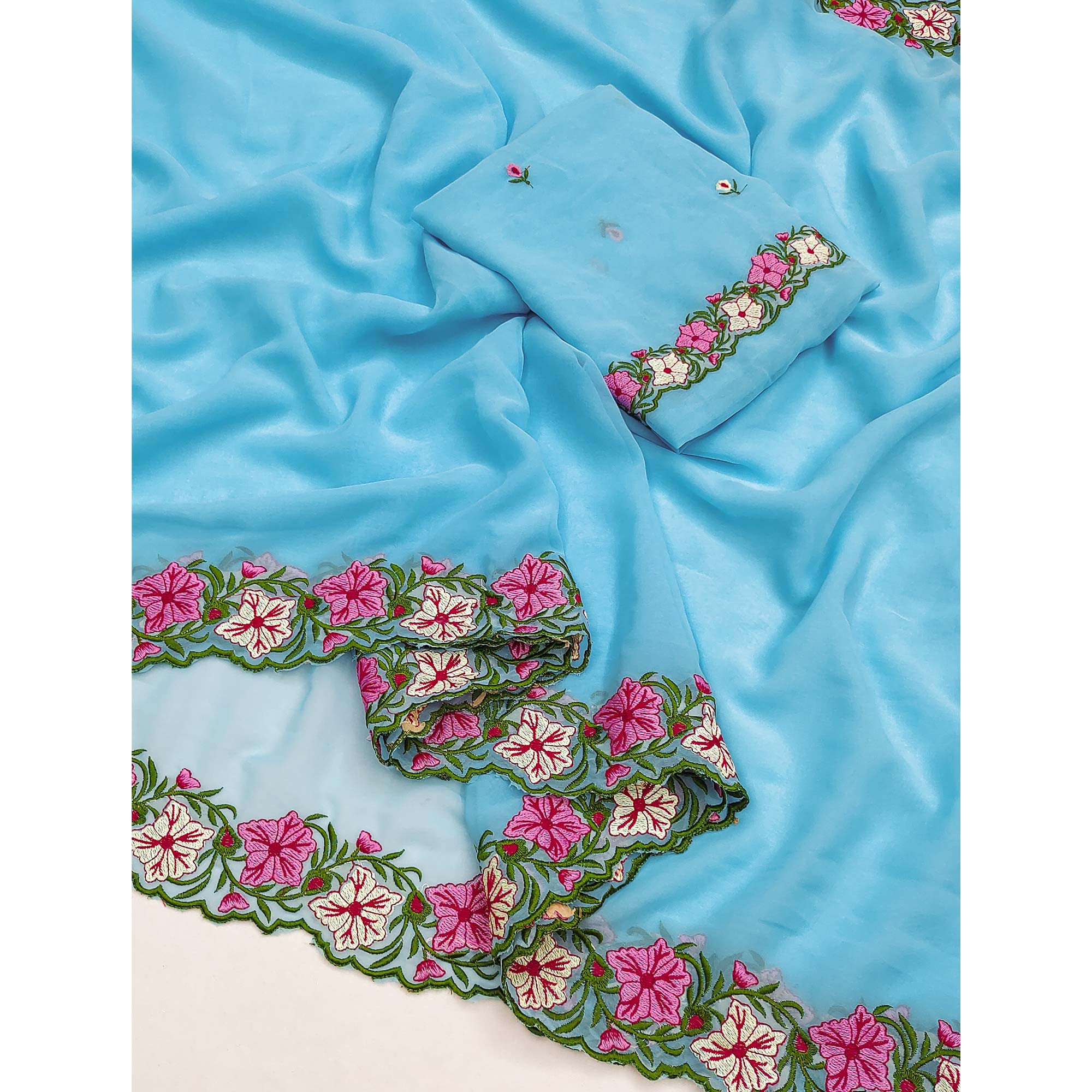 Blue Faux Georgette Saree Featuring Minimalist Floral Border Embroidery