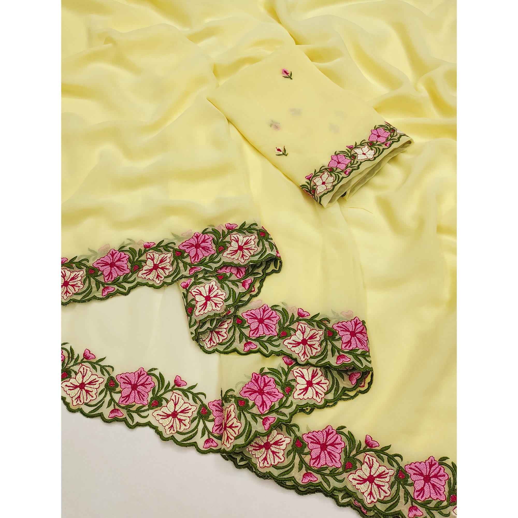 Yellow Faux Georgette Saree Featuring Minimalist Floral Border Embroidery