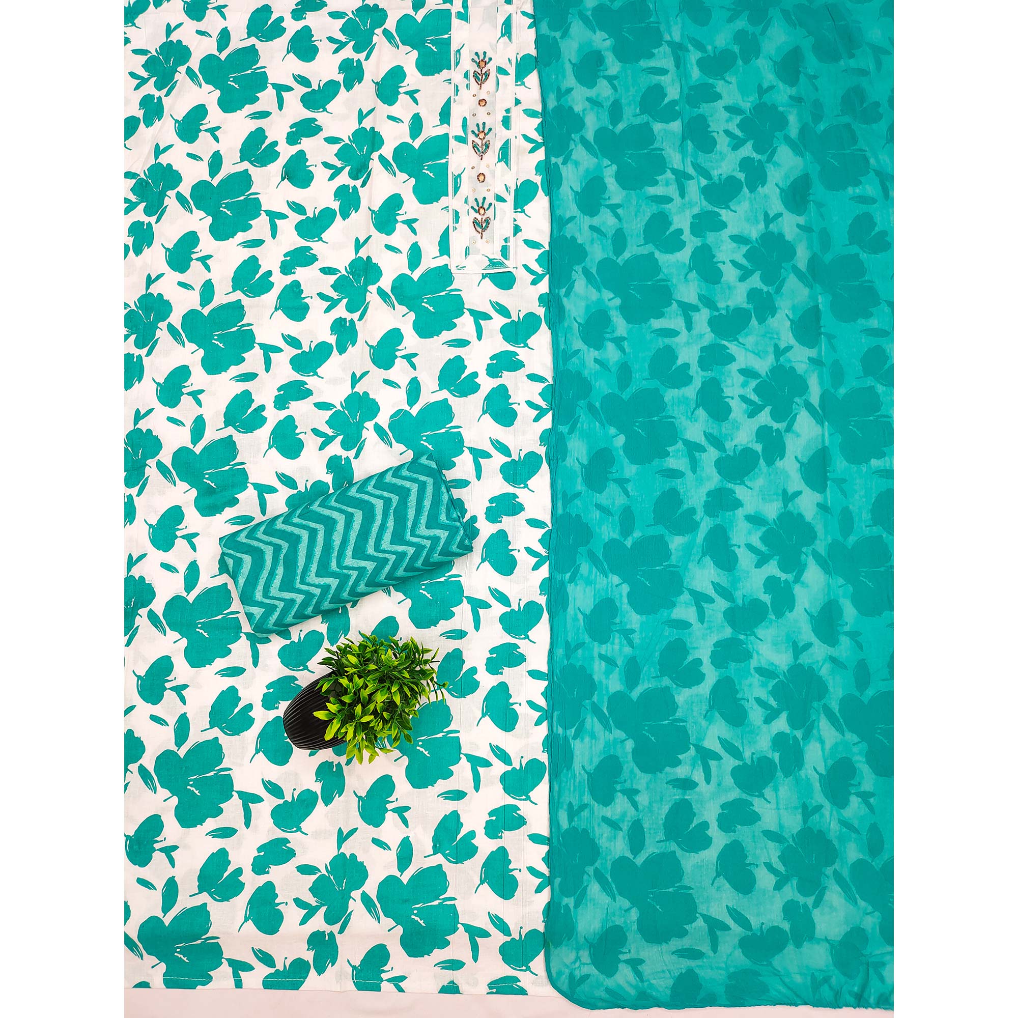 White Base Pure Cotton Dress Material Accented with Beautiful Turquoise Florals