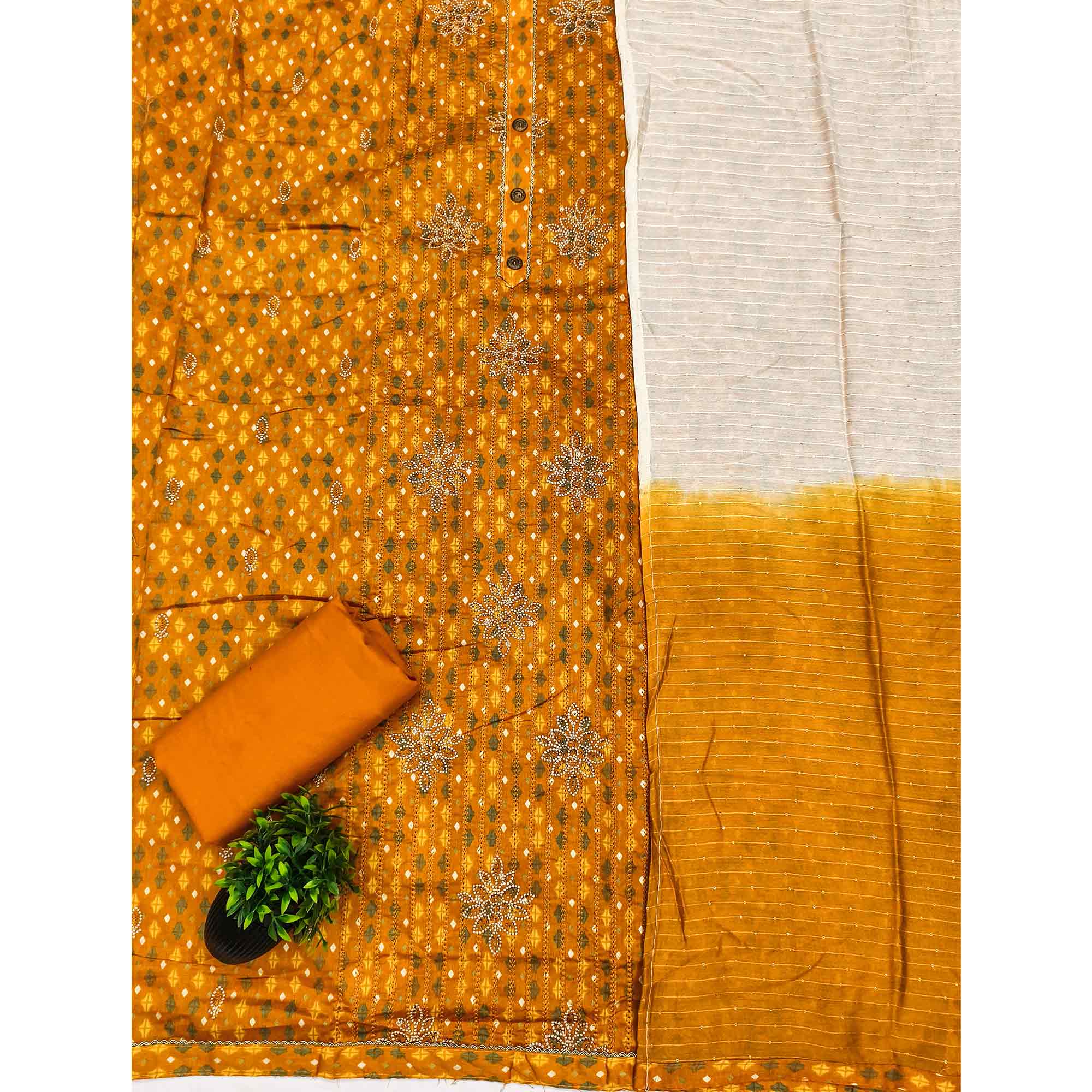 Mustard Cotton Blend Dress Material Adorned With Exquisite Floral Embroidery & Sparkling Stonework