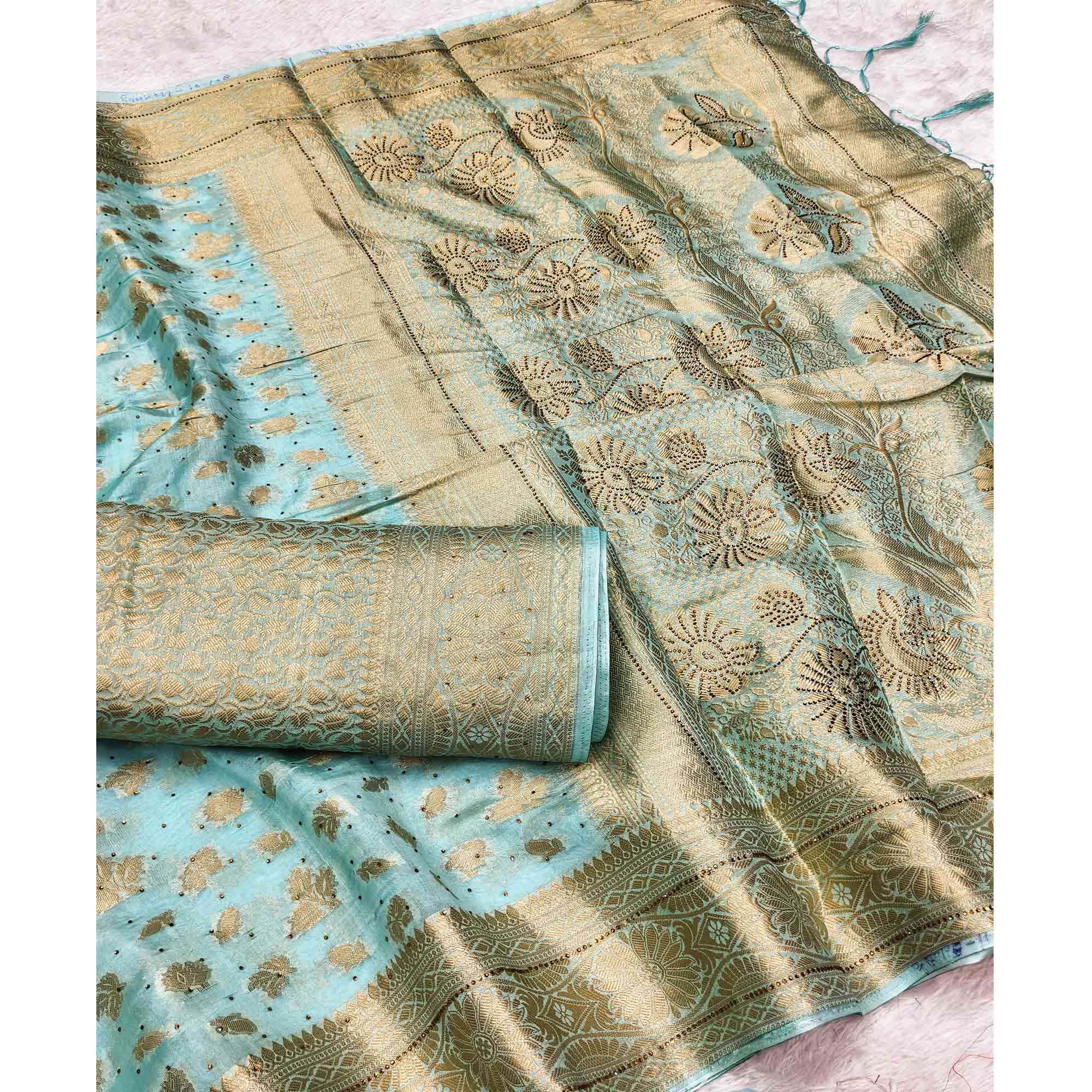 Radiant Turquoise Tissue Banarasi Saree With Intricate Floral Zari Weaving & Stone Embellishments