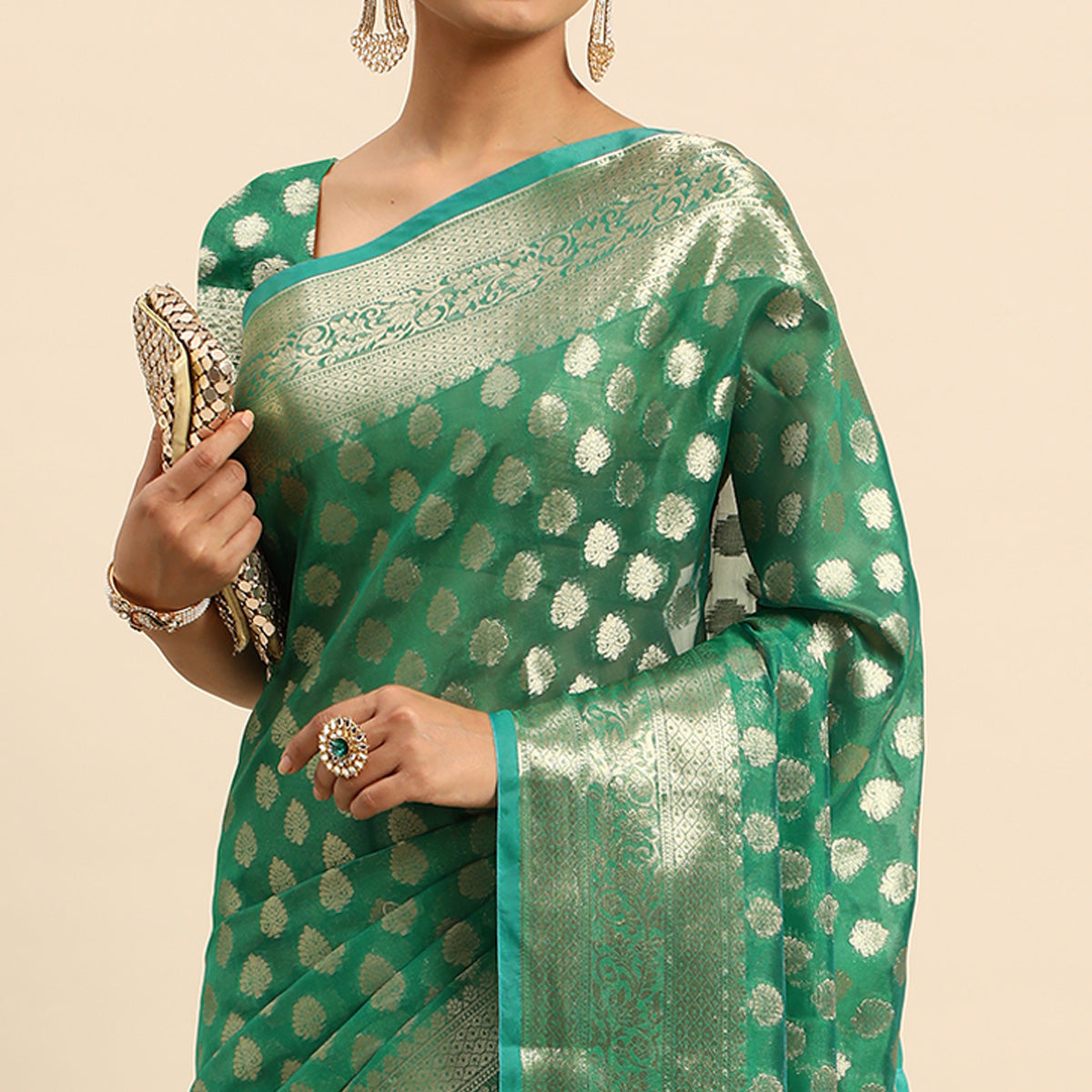 Green Woven Organza Silk Saree With Tassels