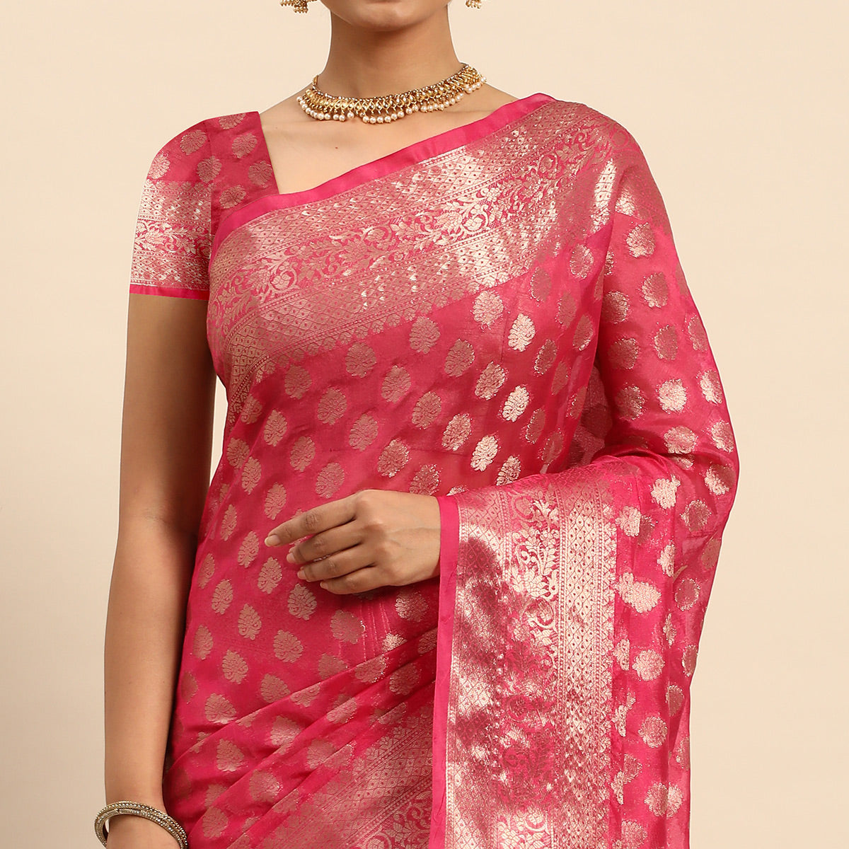 Rani Pink Woven Organza Silk Saree With Tassels