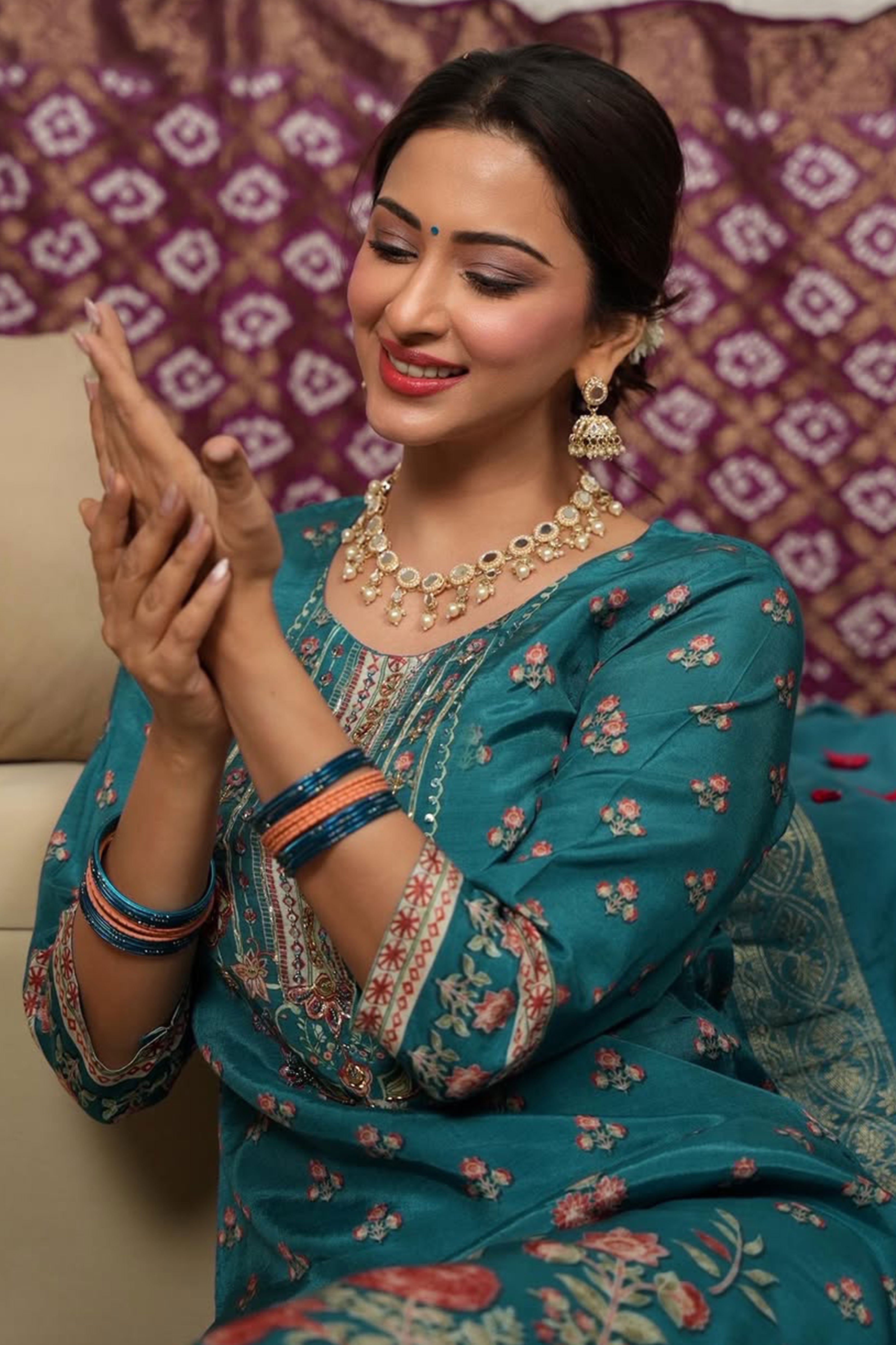 Beautiful Turquoise Floral Printed Straight Suit Designed in Lightweight Pure Muslin