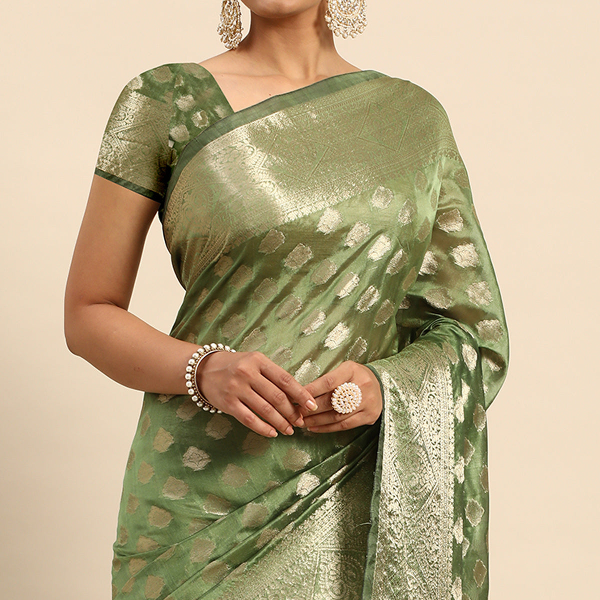 Green Woven Organza Silk Saree With Tassels