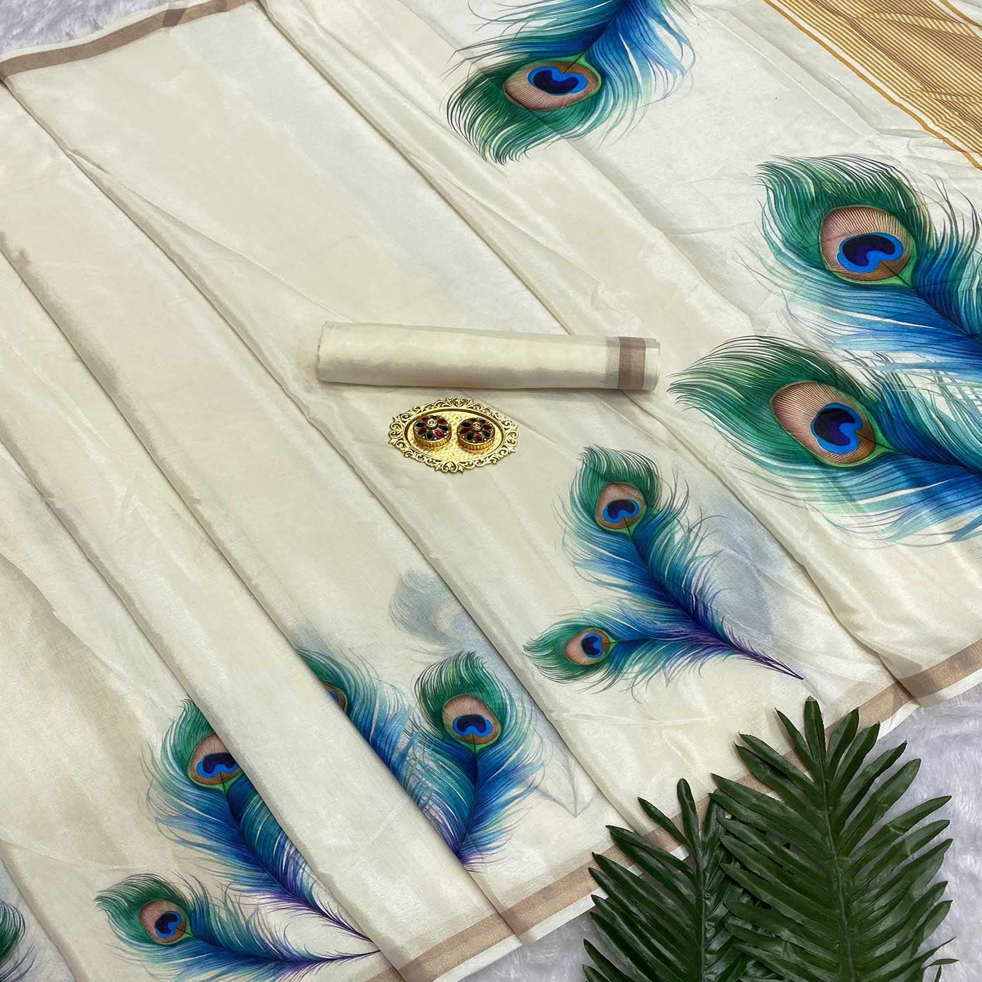 Charming Off White Soft Tussar Cotton Silk Saree with Peacock Feathers Print