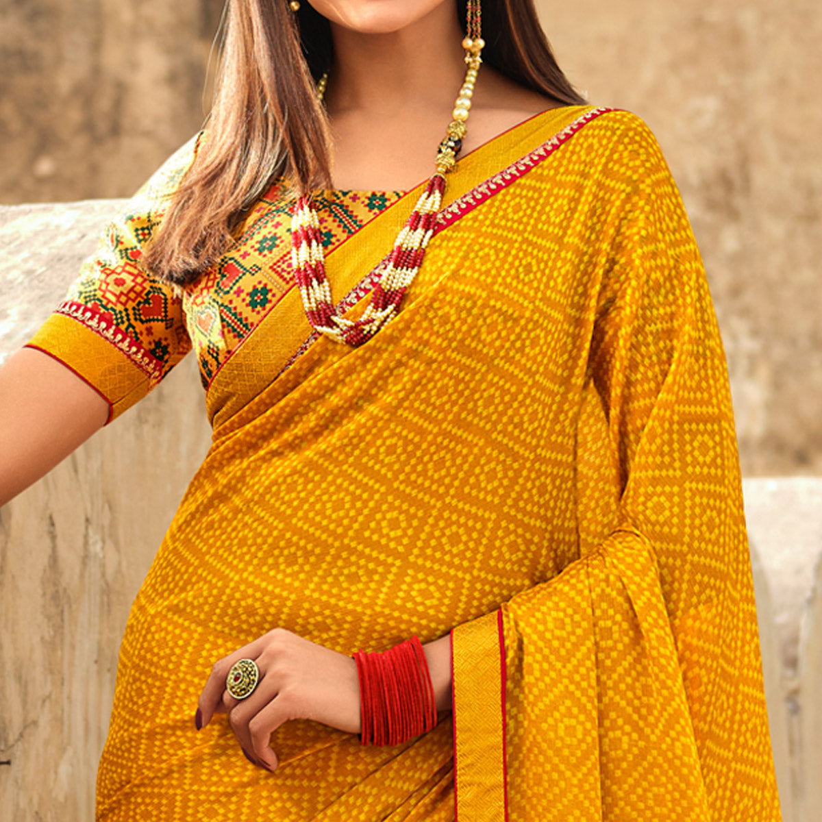 Yellow Bandhani Printed With Embroidered Border Chiffon Saree