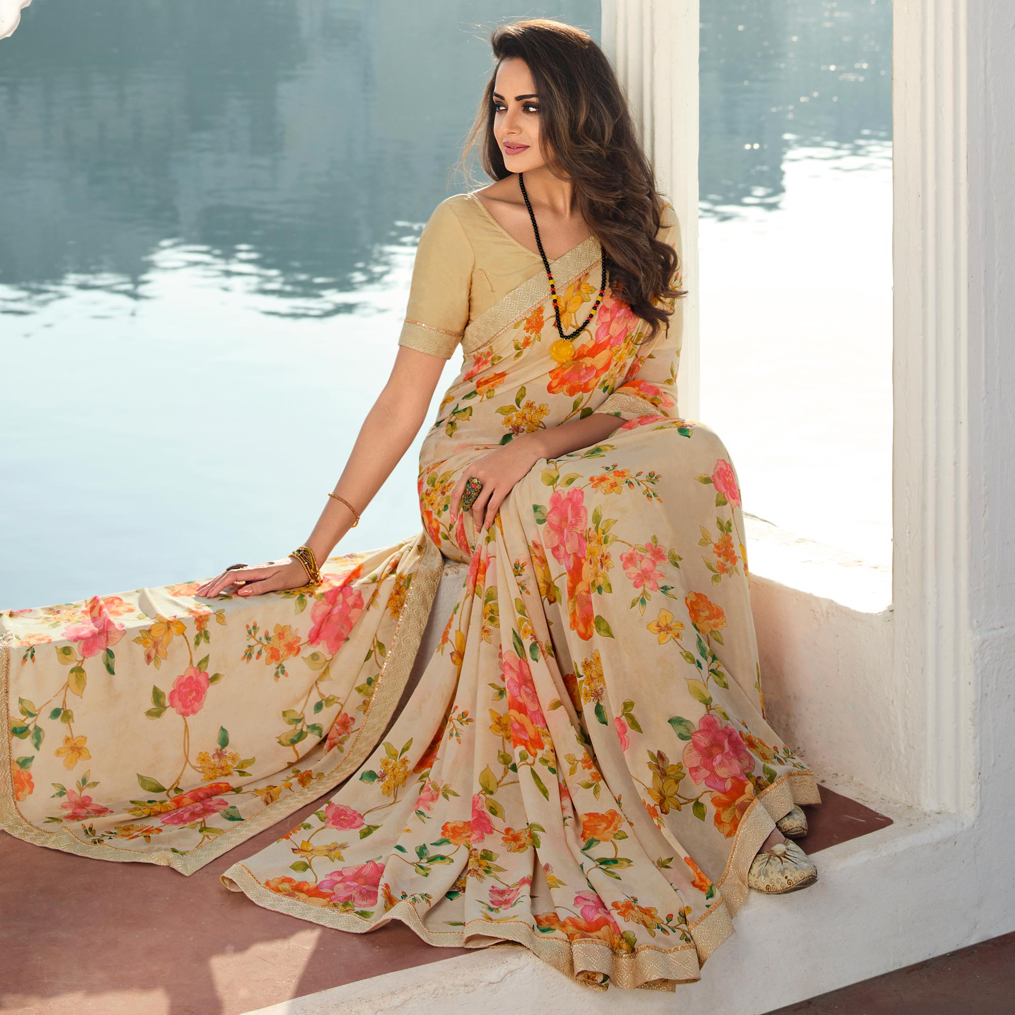 Cream Floral Printed With Embroidered Border Georgette Saree