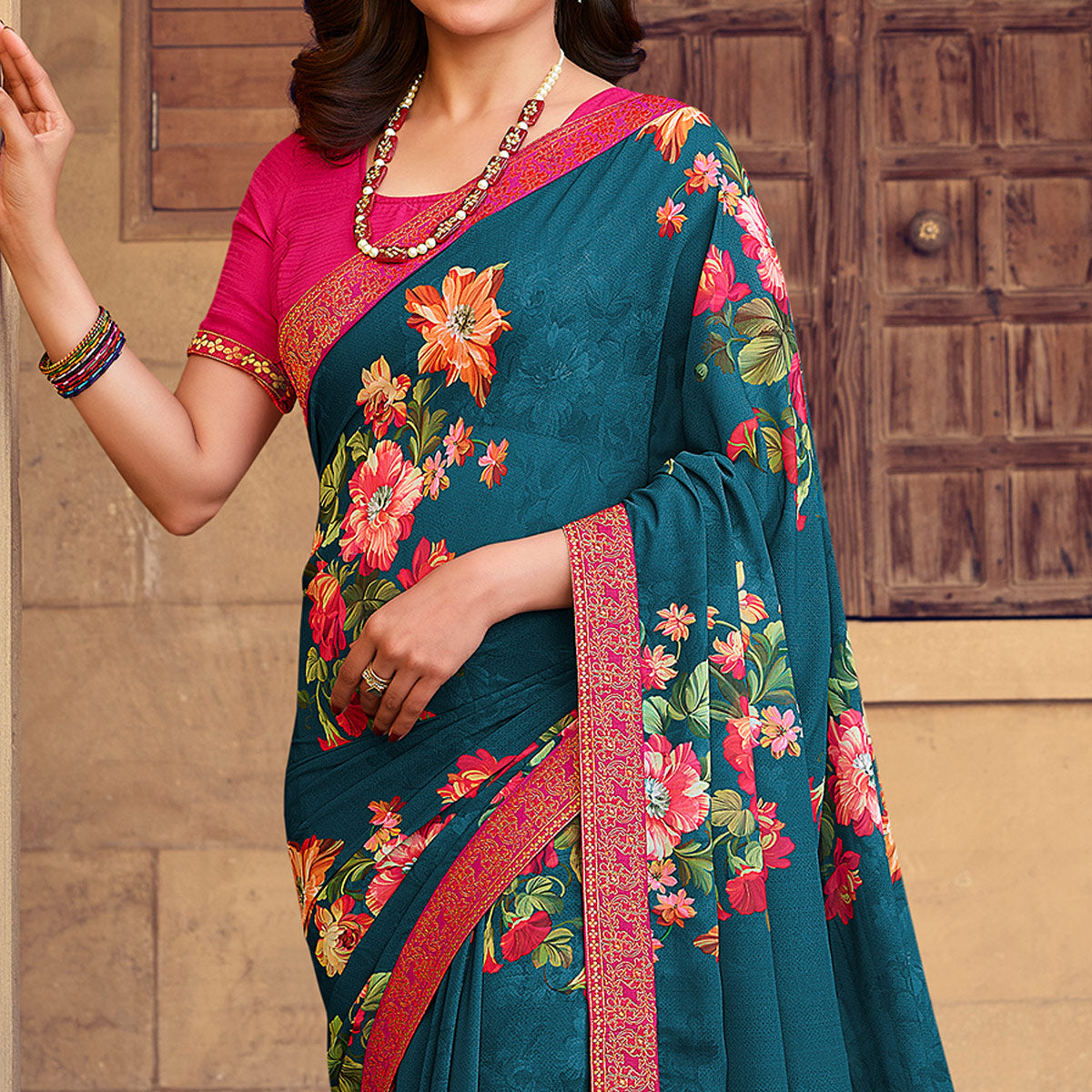 Teal Blue Floral Printed Georgette Saree