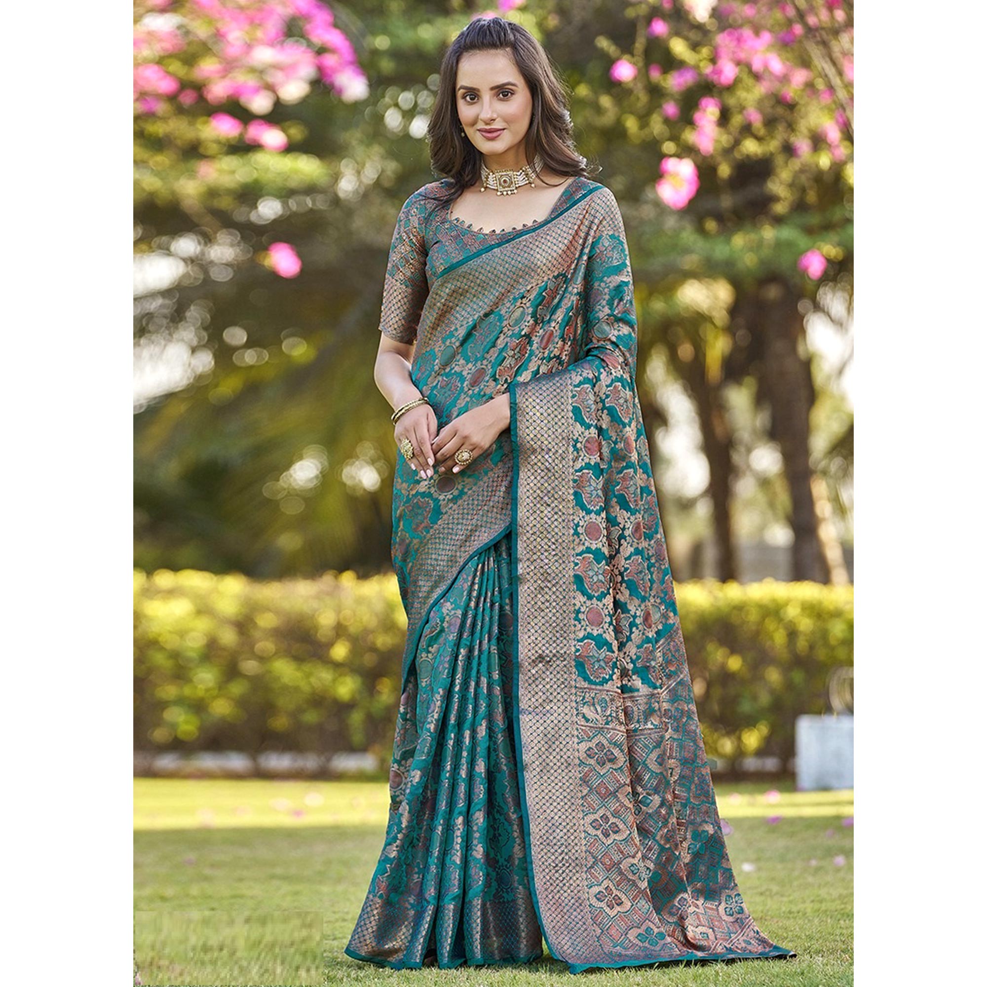 Teal Woven Organza Saree