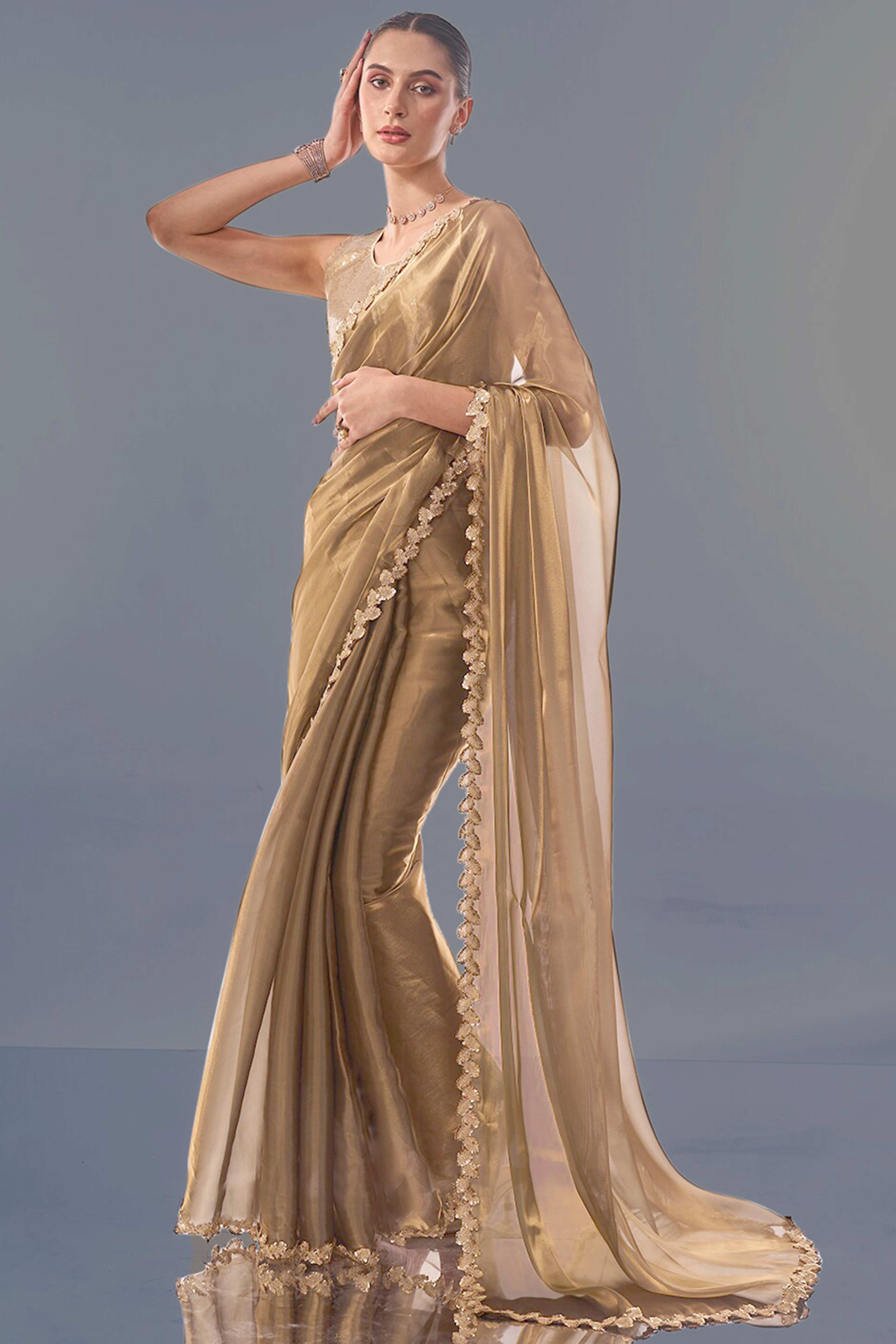 Golden Solid Tissue Jimmy Choo Saree With Sequins Embroidered Cut Work Lace