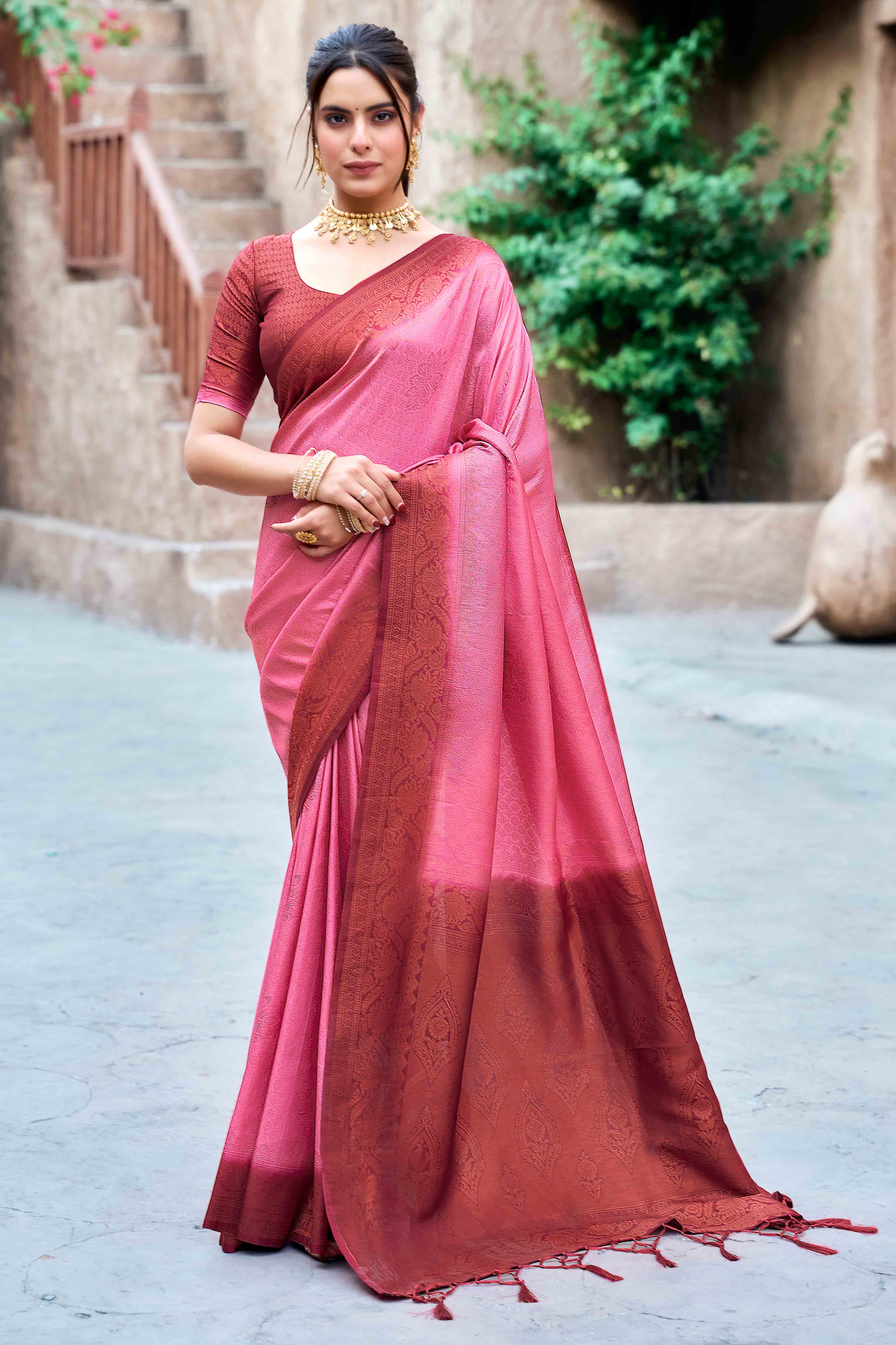 Gajari Pink Banarasi Silk Saree Featuring Elegant Floral Woven & Delicate Tassel Edging
