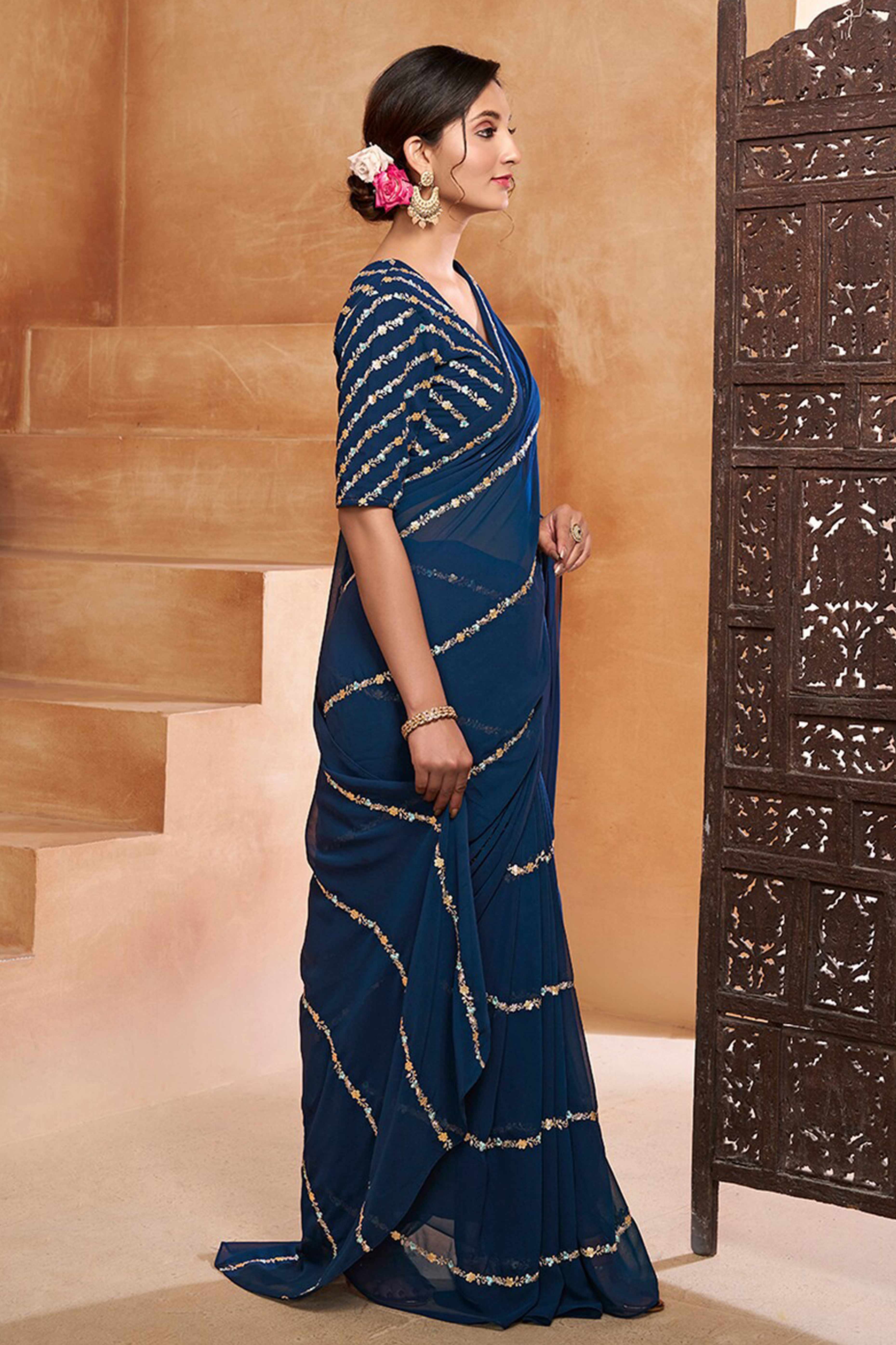 Graceful Blue Floral Georgette Saree Embellished With Fine Sequins Embroidery