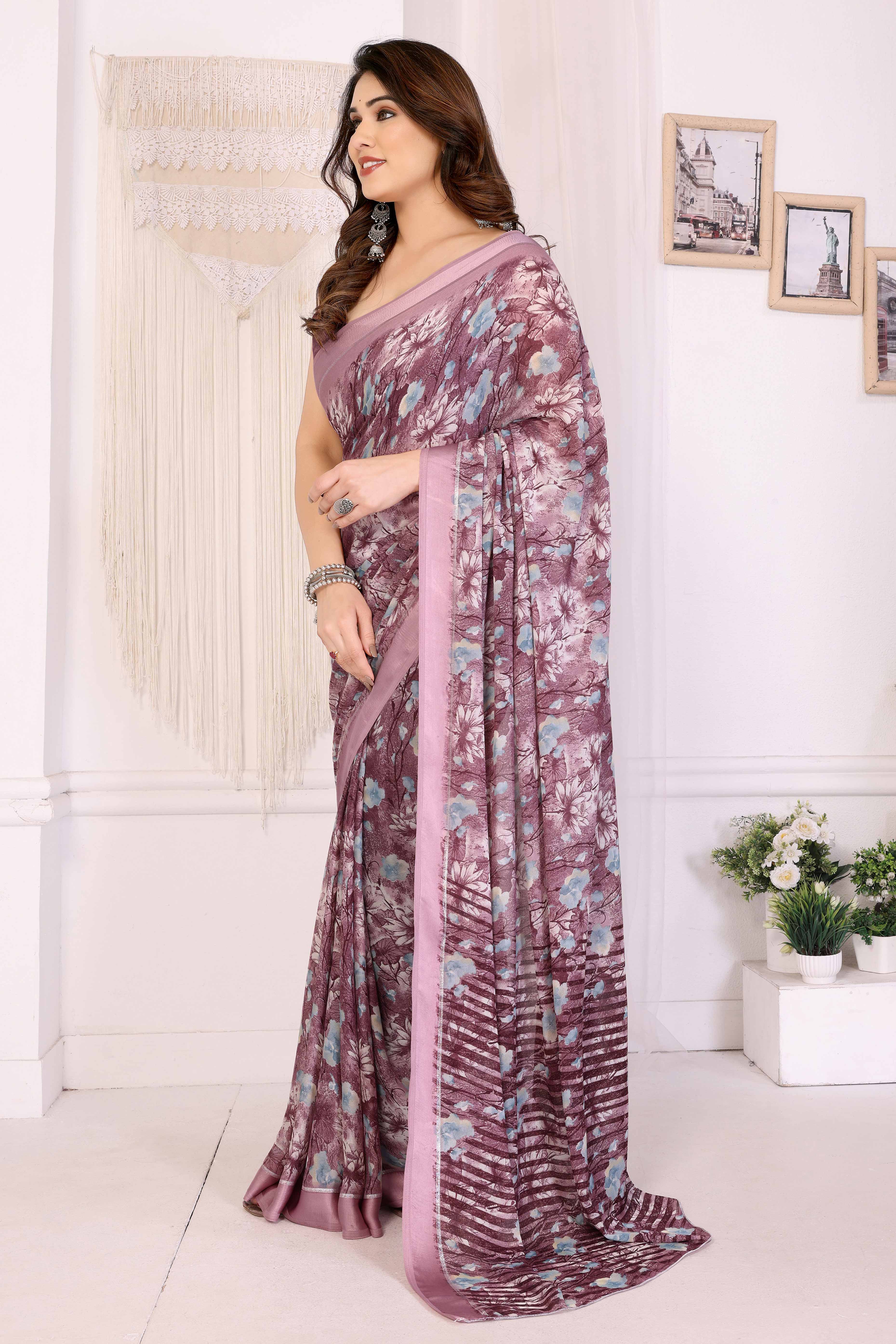 Mauve Floral Printed Blue Crepe Saree Styled With A Smooth Satin Patta Border