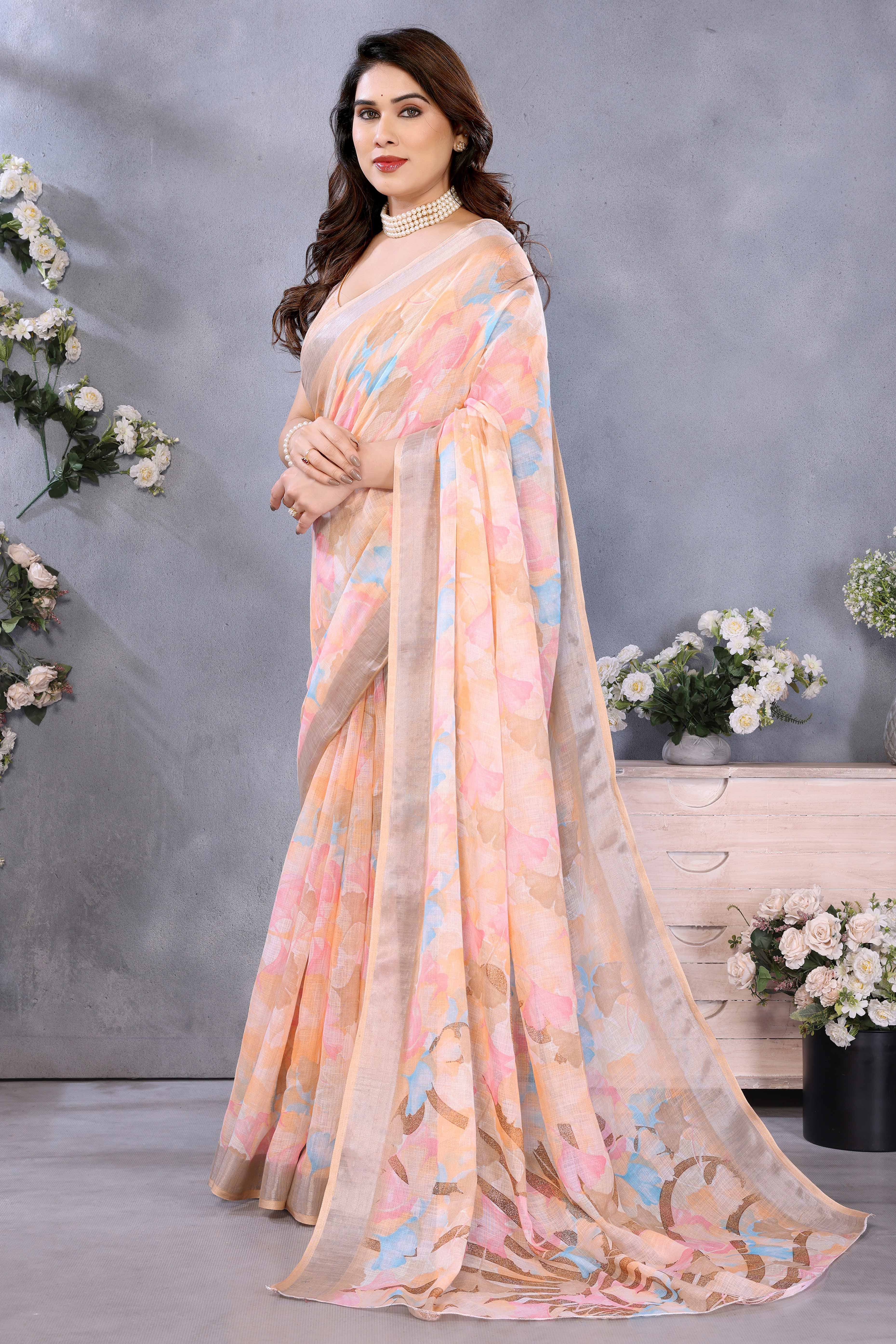 Orange Floral Printed Linen Saree Accented With A Classic Patta Border