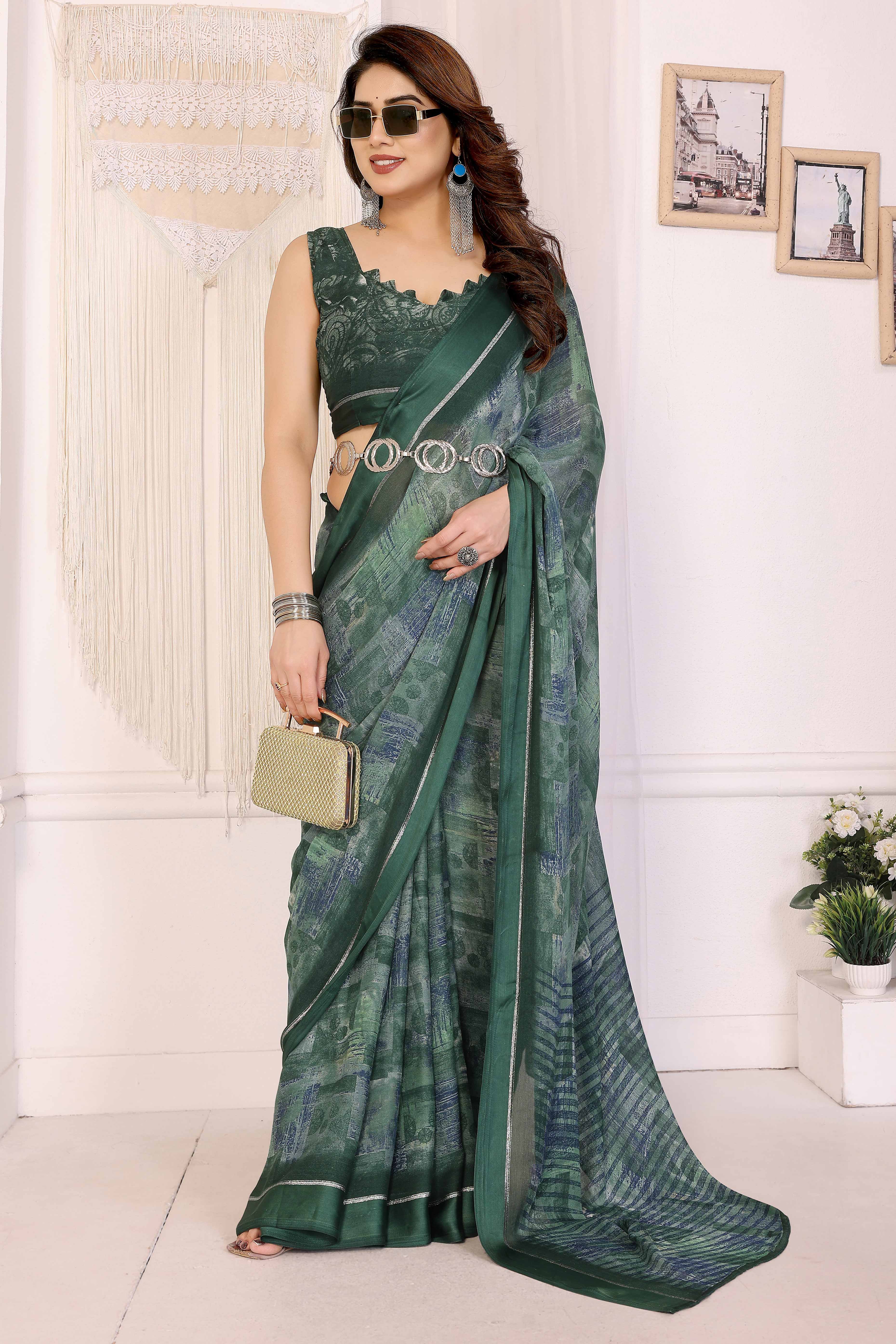 Trendy Green Moss Crepe Saree with Floral Motifs and Satin Border