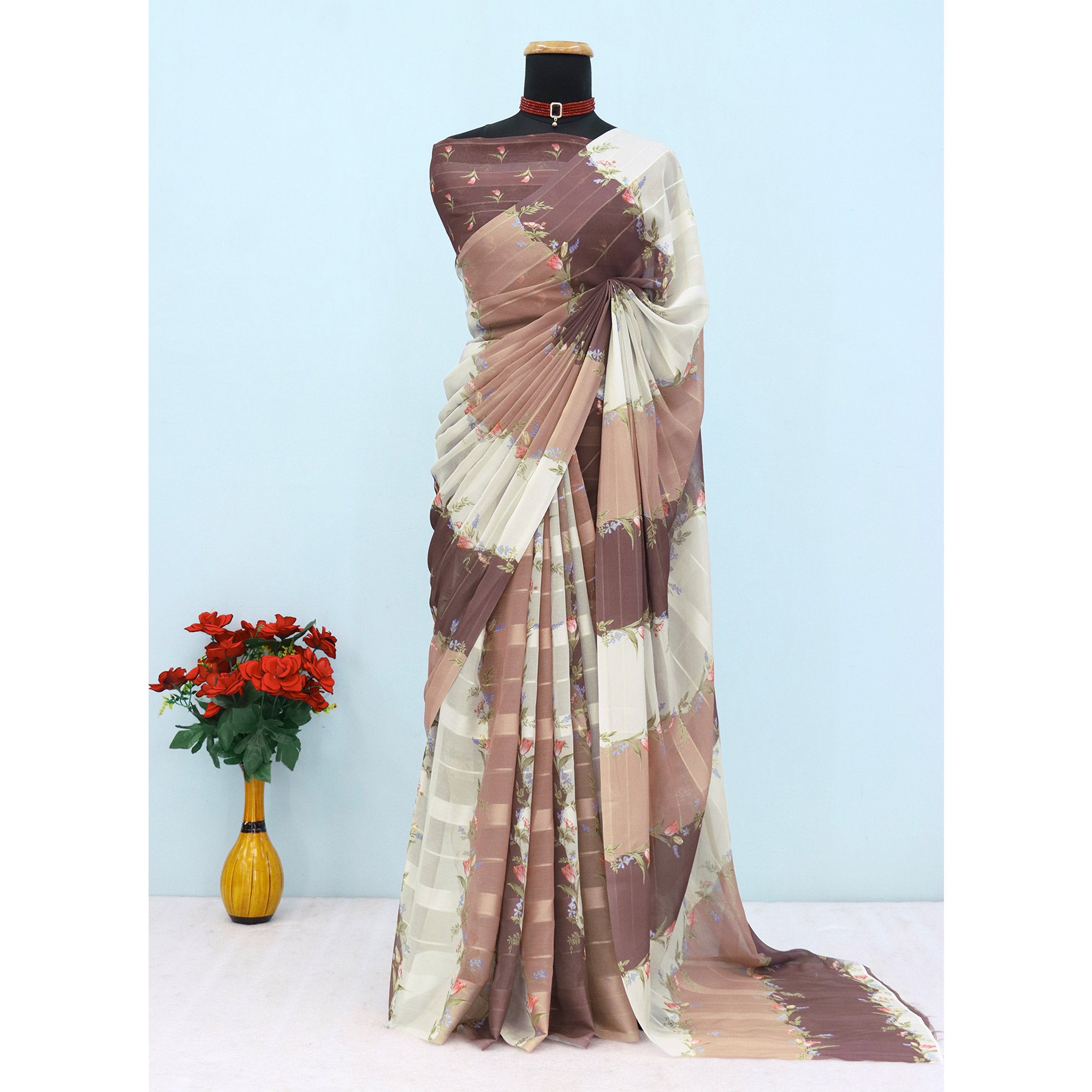 Brown Bloom Floral Digital Printed Georgette Saree Accentuated With Graceful Zari Stripes