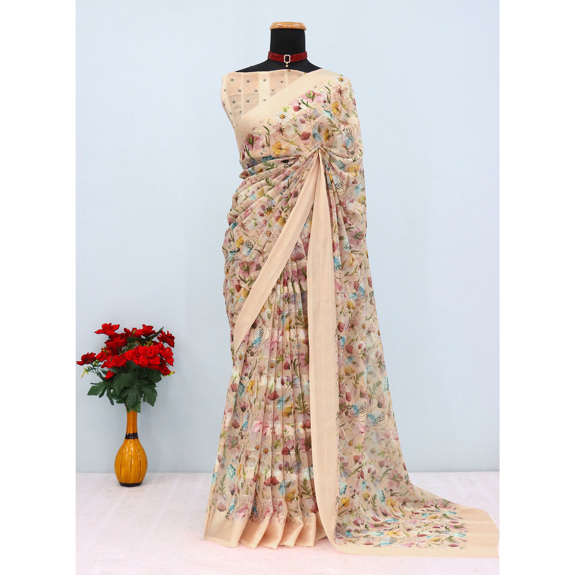 Peach Bloom Floral Digital Printed Georgette Saree Accentuated With Graceful Zari Stripes