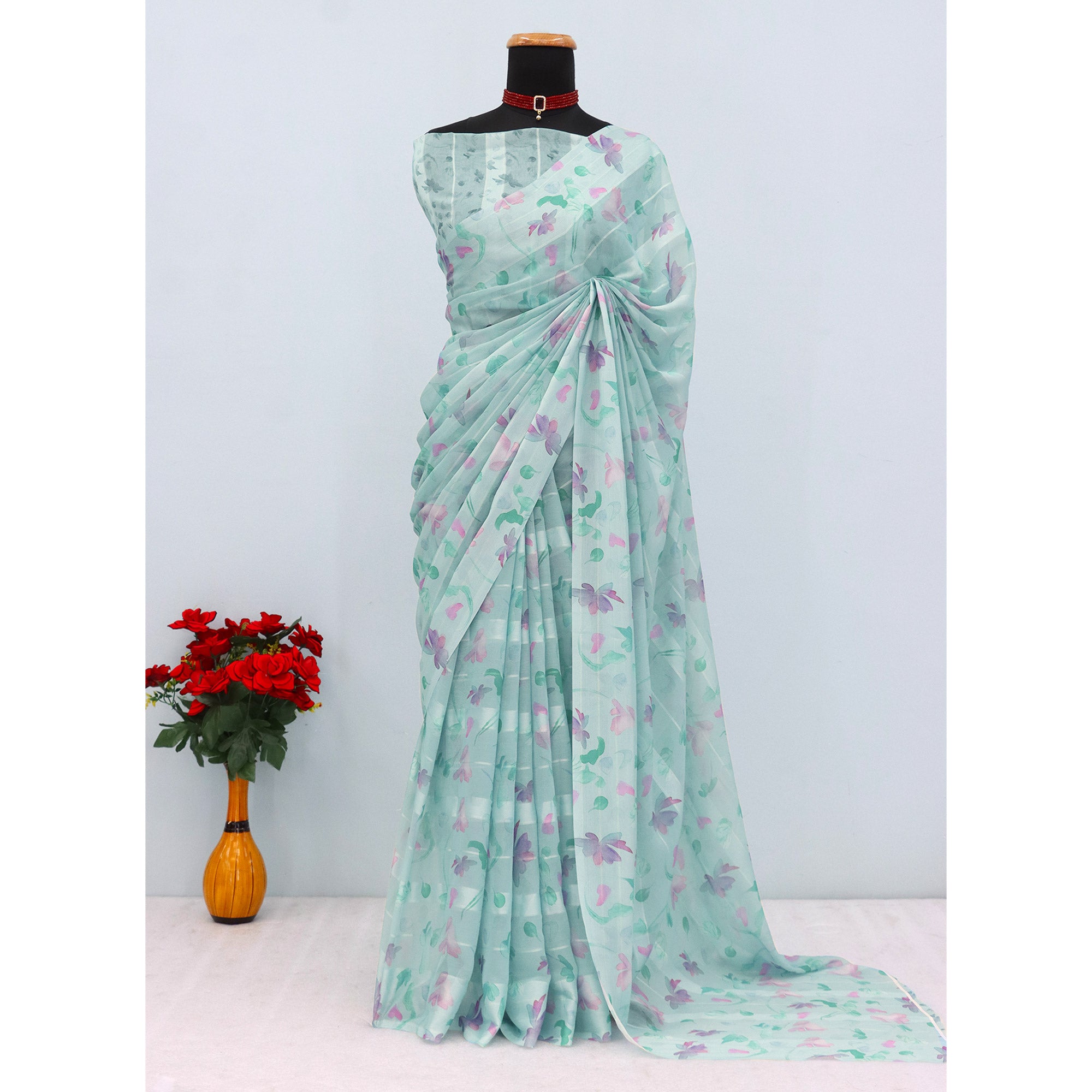 Sky Blue Bloom Floral Digital Printed Georgette Saree Accentuated With Graceful Zari Stripes