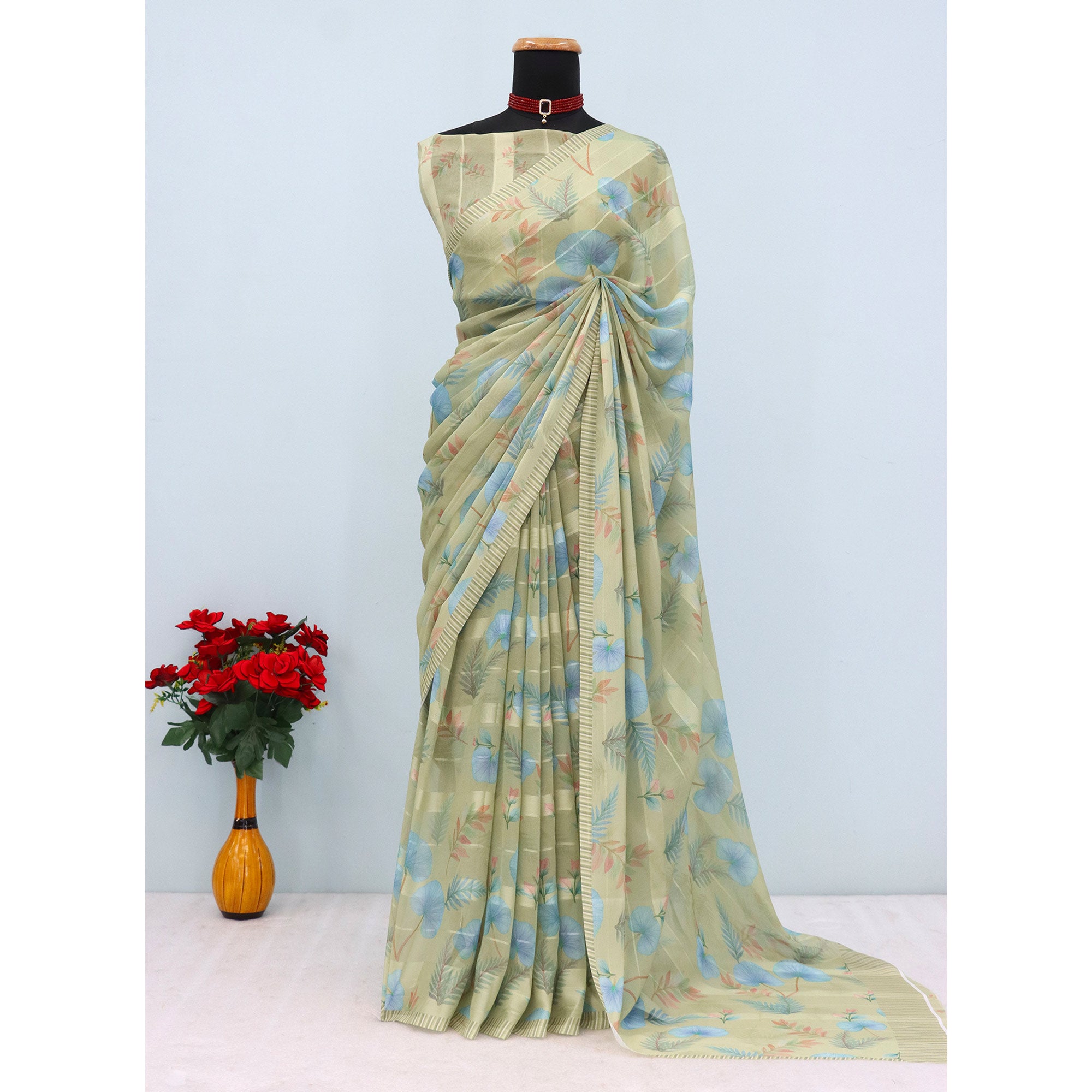 Pista Green Bloom Floral Digital Printed Georgette Saree Accentuated With Graceful Zari Stripes