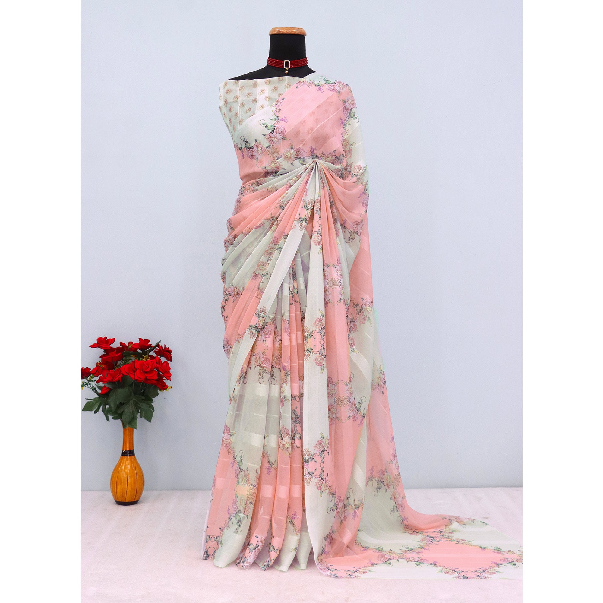 White & Peach Bloom Floral Digital Printed Georgette Saree Accentuated With Graceful Zari Stripes