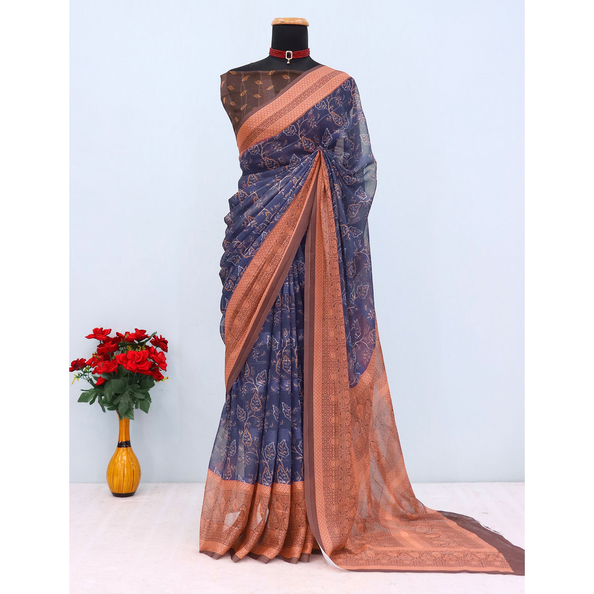 Elegant Navy Blue & Brown Floral Digital Printed Georgette Saree Adorned With Subtle Zari Stripes