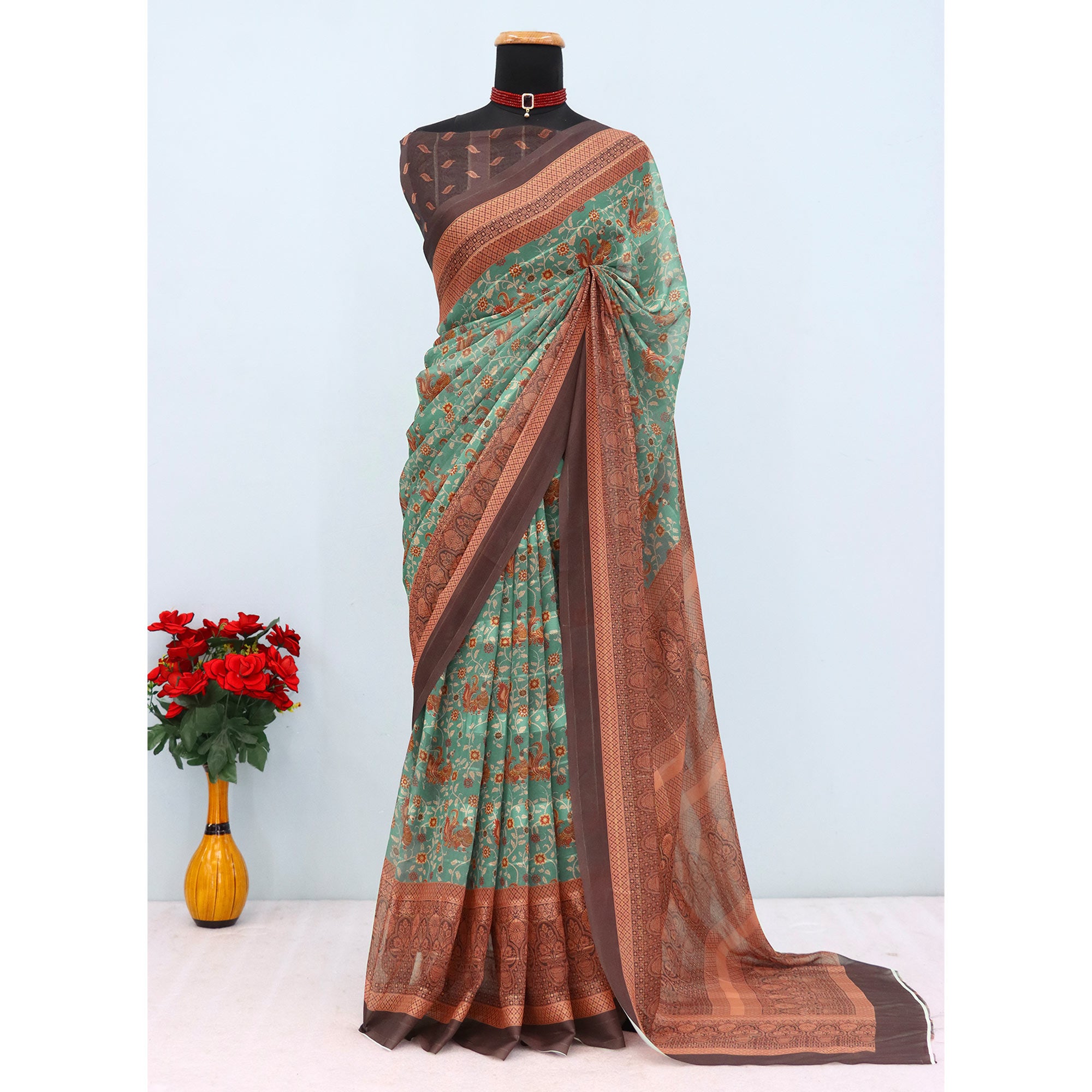 Elegant Green & Brown Floral Digital Printed Georgette Saree Adorned With Subtle Zari Stripes