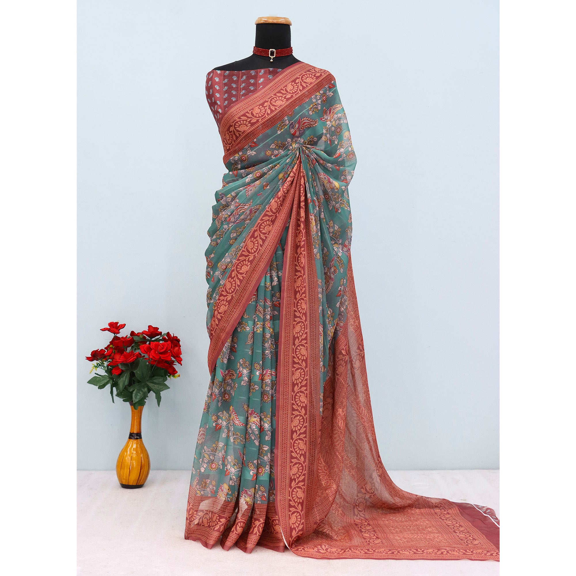 Elegant Rama Green & Maroon Floral Digital Printed Georgette Saree Adorned With Subtle Zari Stripes