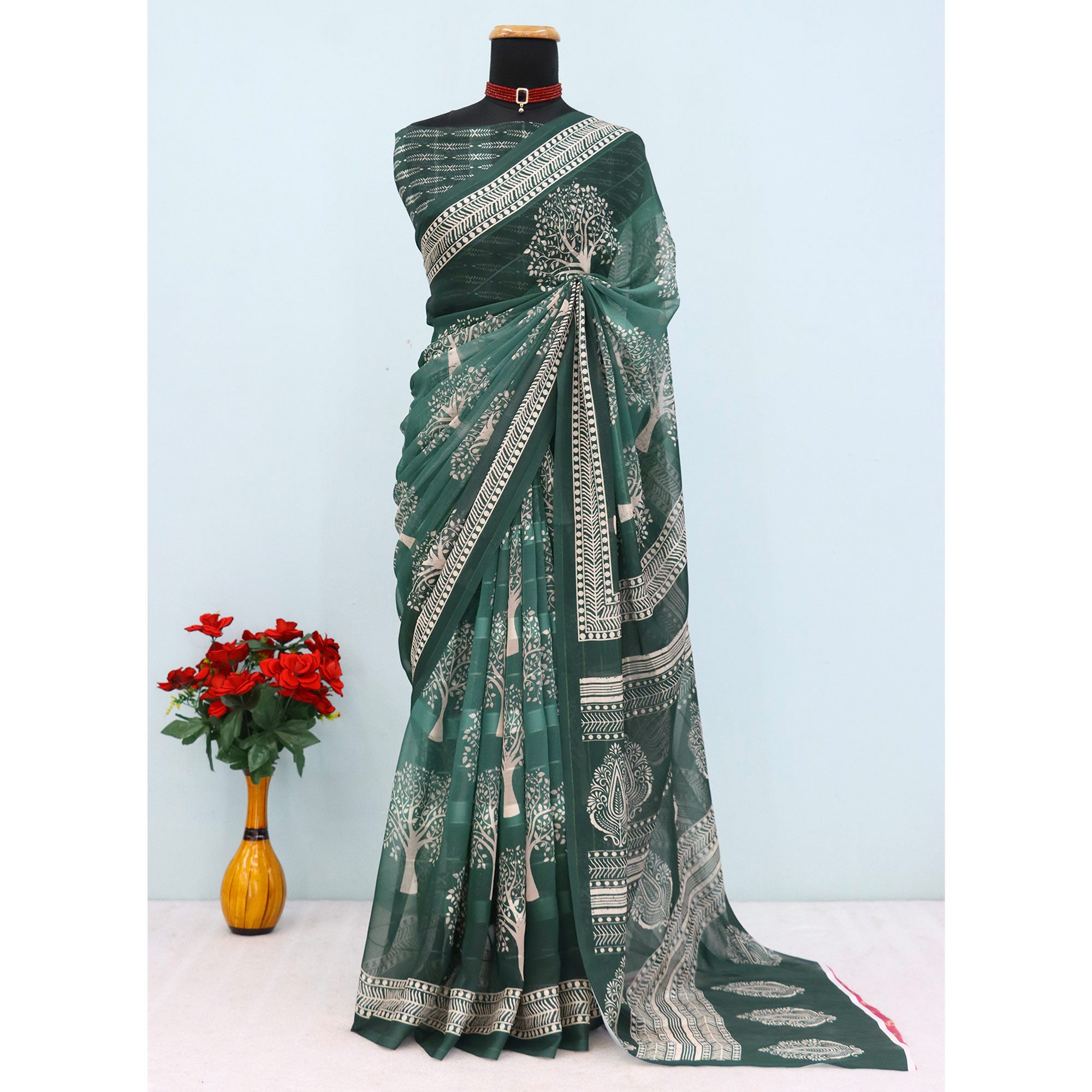 Charming Green Digital Tree Printed Georgette Saree Accentuated With Zari Stripes