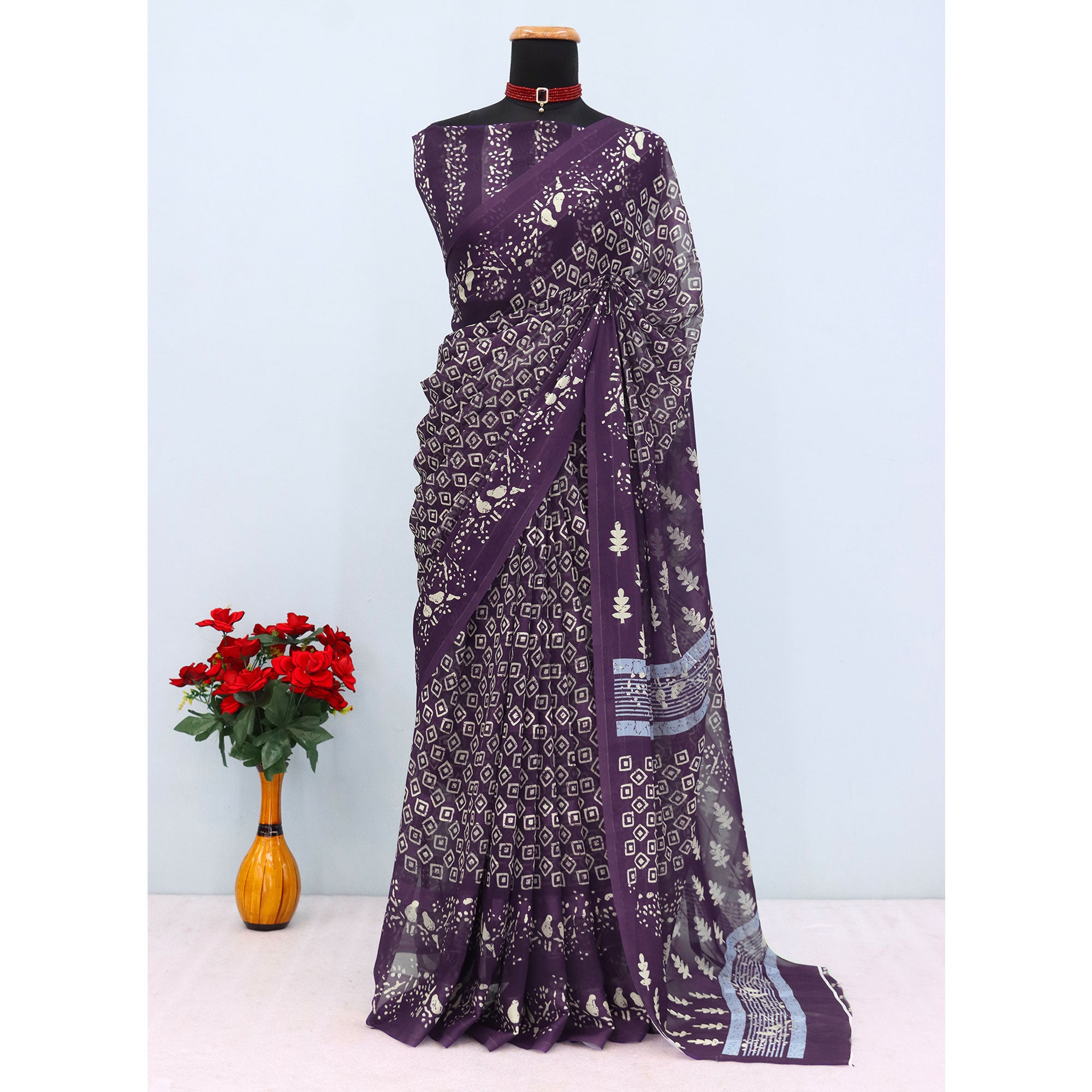 Charming Purple Geometric Digital Printed Georgette Saree Accentuated With Zari Stripes