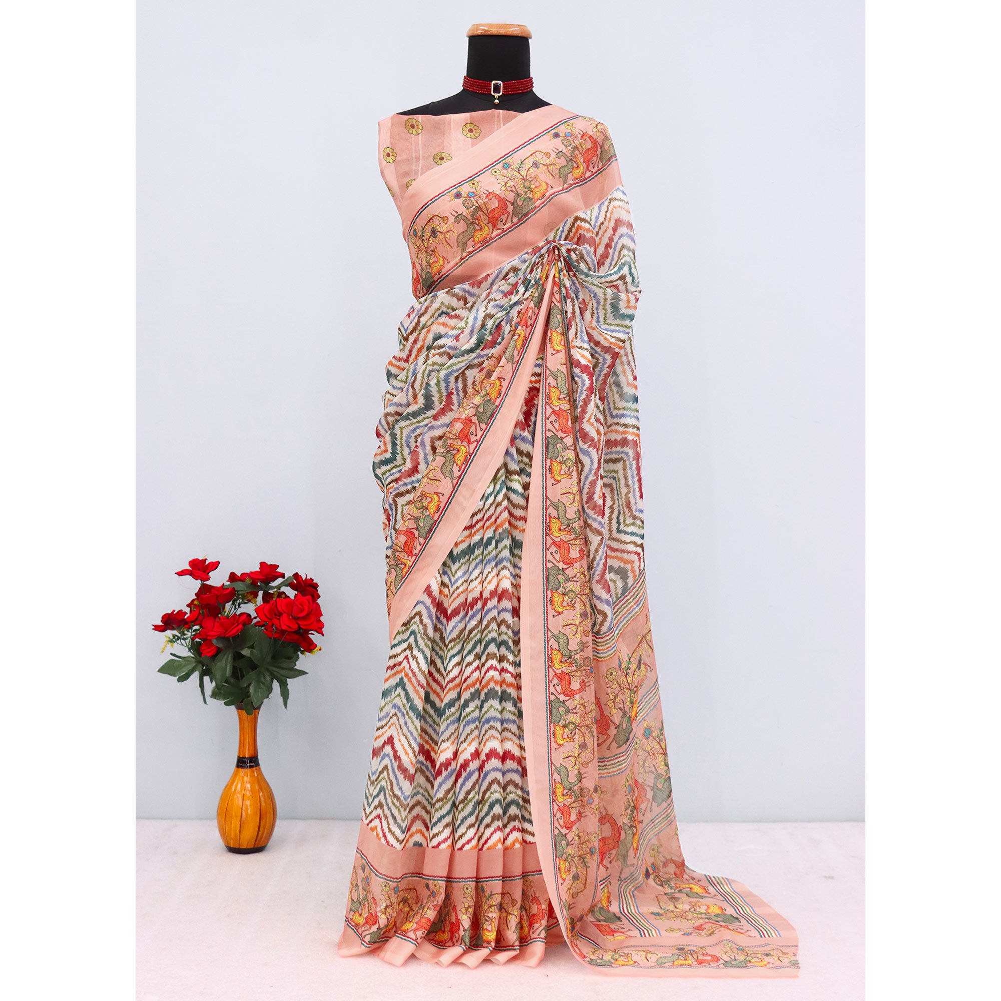 Charming Peach Zig Zag & Floral Digital Printed Georgette Saree Accentuated With Zari Stripes
