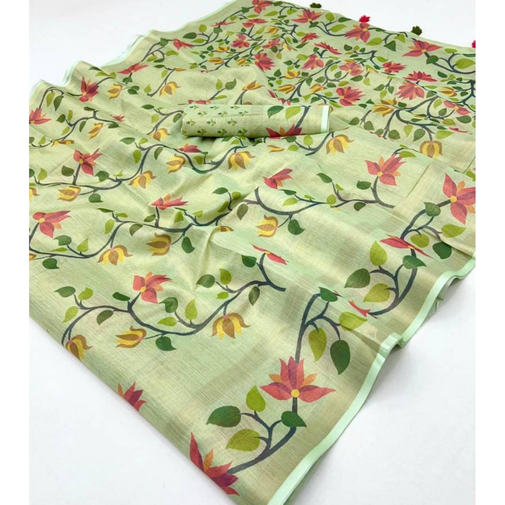 Green Floral Printed Tissue Cotton Silk Saree Enhanced with a Classic Zari Weaving Border