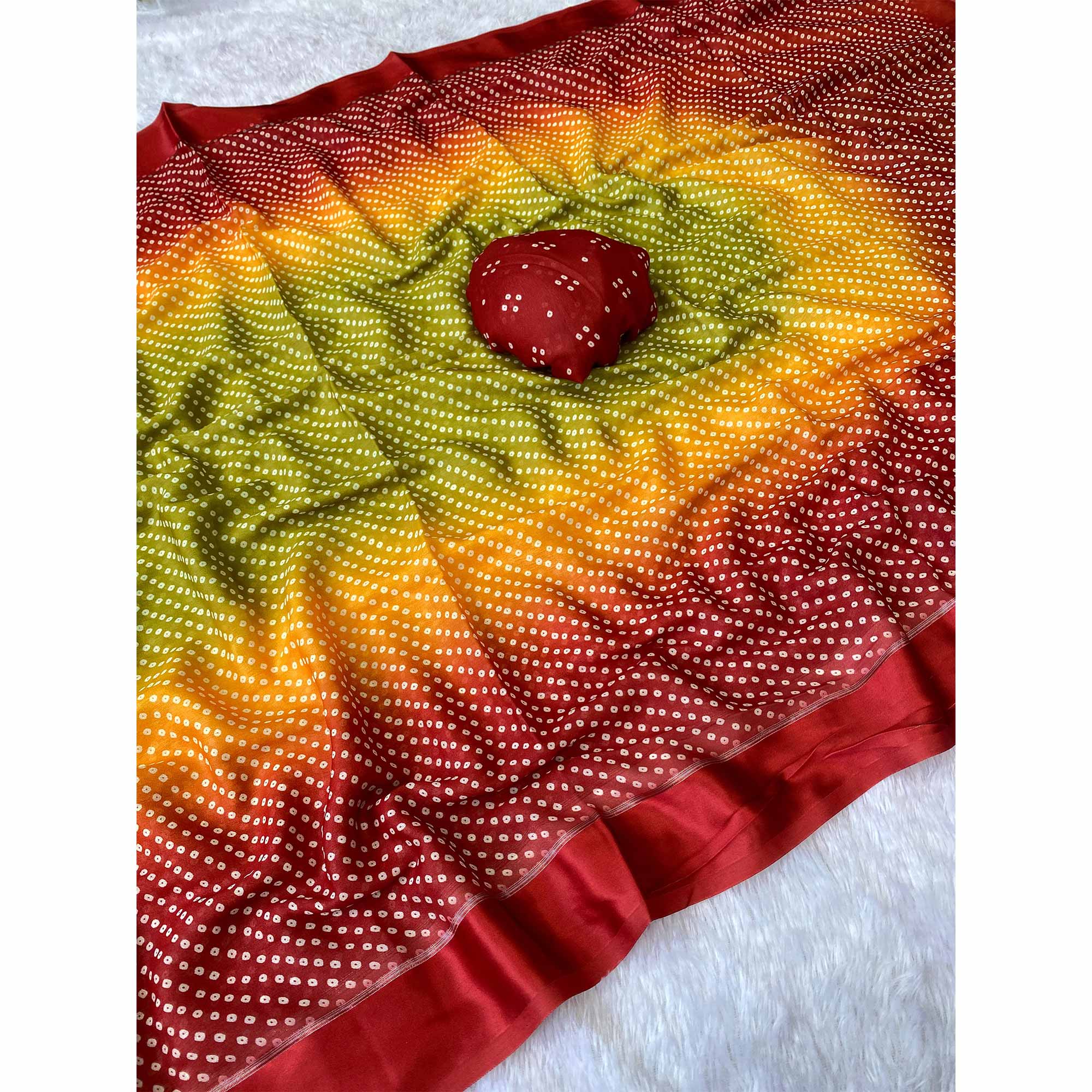 Designer Bandhani Saree in Green & Red Crafted from Soft Moss Georgette