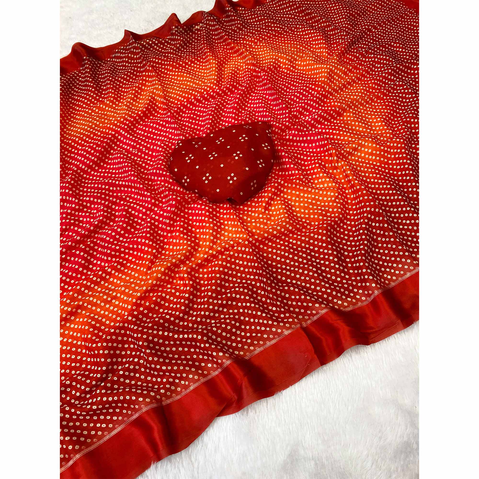 Designer Bandhani Saree in Red Crafted from Soft Moss Georgette