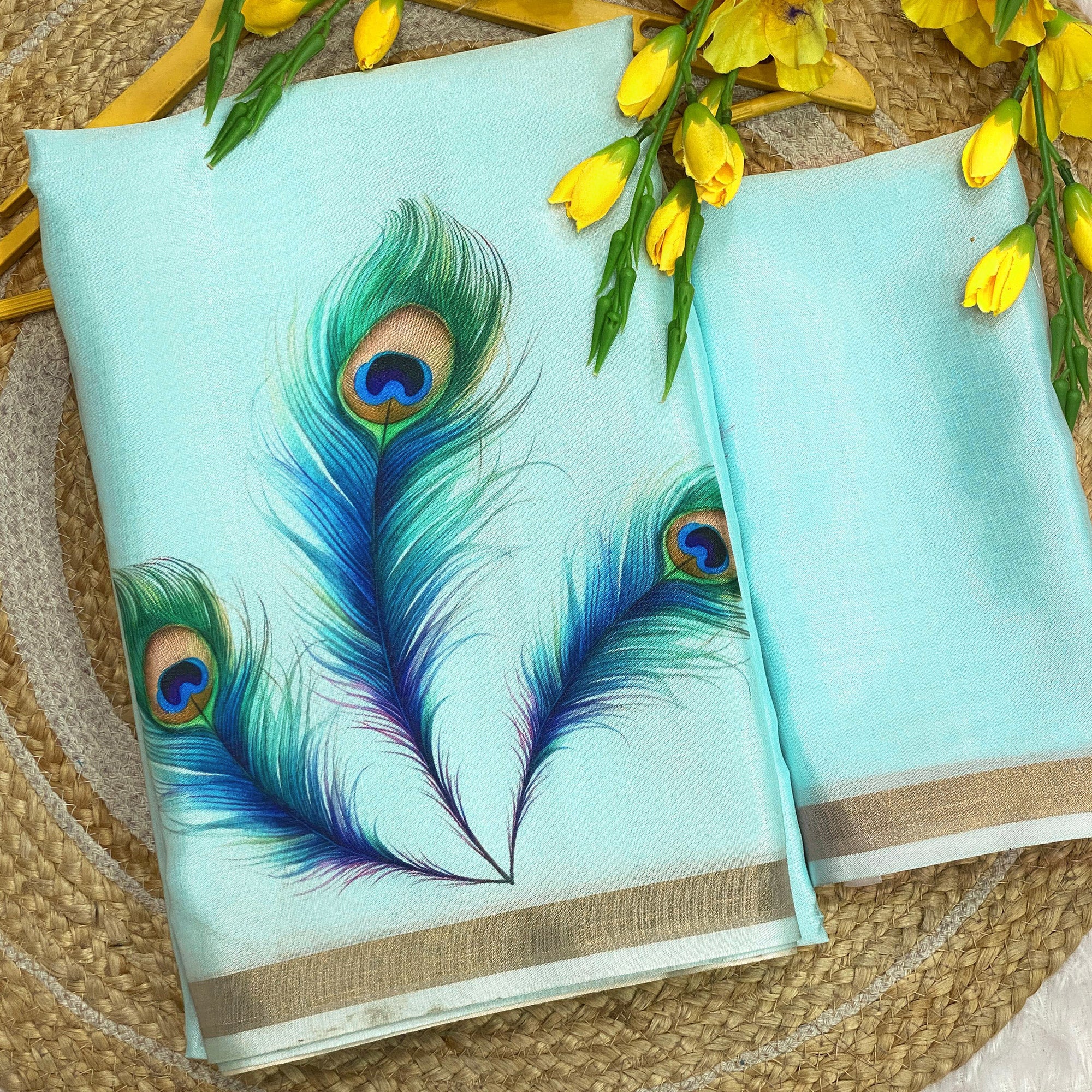 Charming Blue Soft Tussar Cotton Silk Saree With Peacock Feathers Print