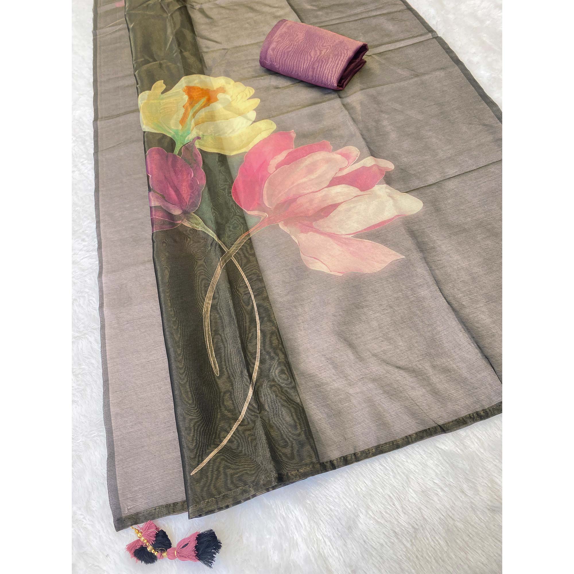 Sophisticated Black Floral Digital Print Tissue Saree Enhanced With Handmade Tassels