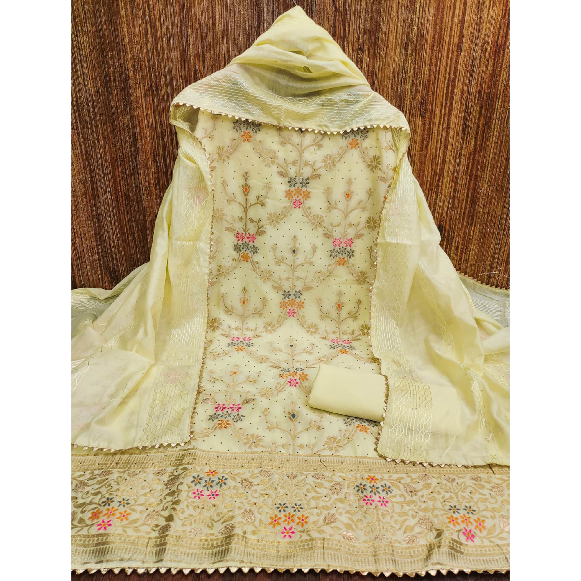 Light Yellow Floral Zari Weaving Banarasi Silk Dress Material