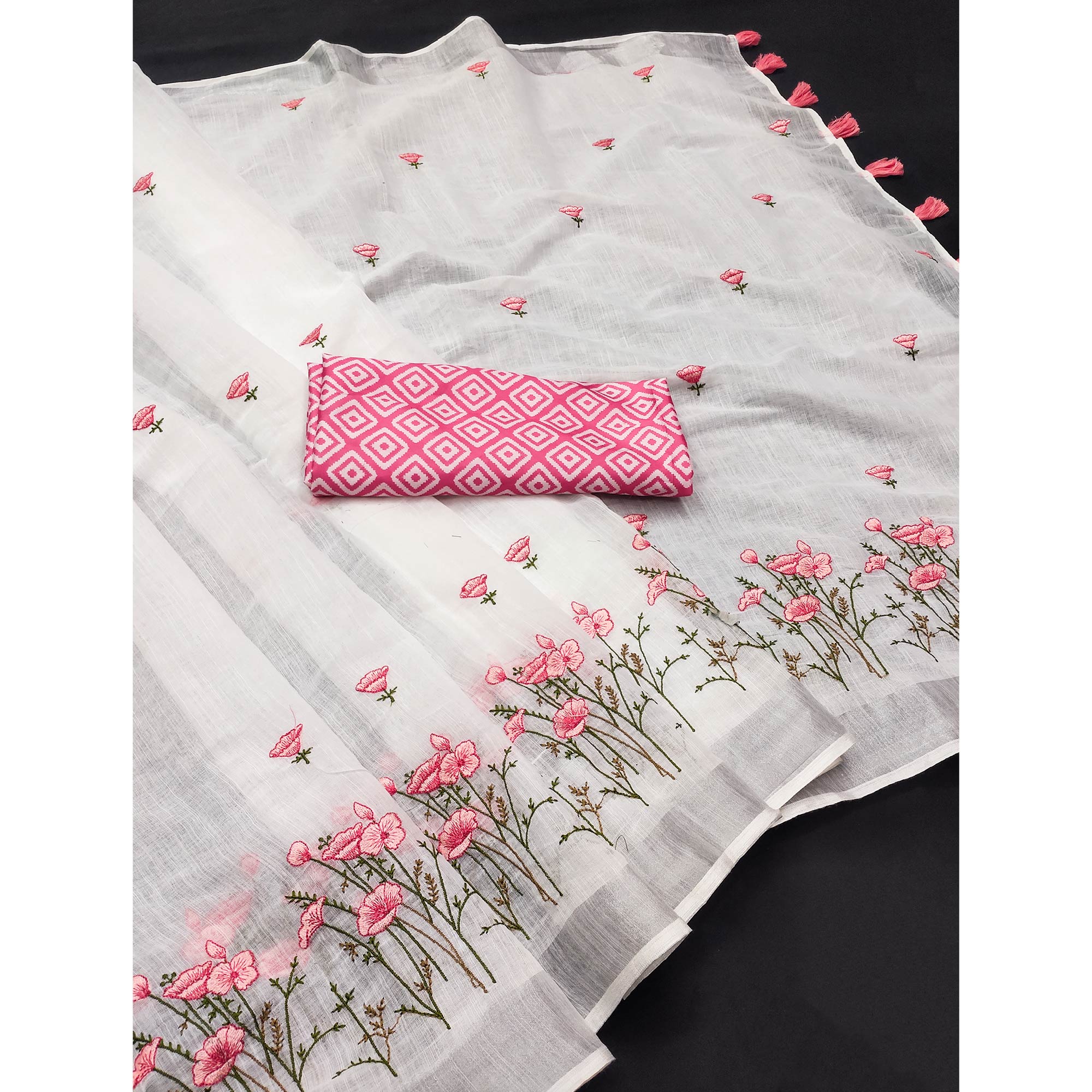 White Pure Linen Saree with Floral Embroidery and Tassel Detailing