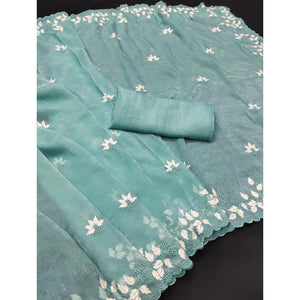 Turquoise Organza Saree Featuring Fine Floral Embroidery