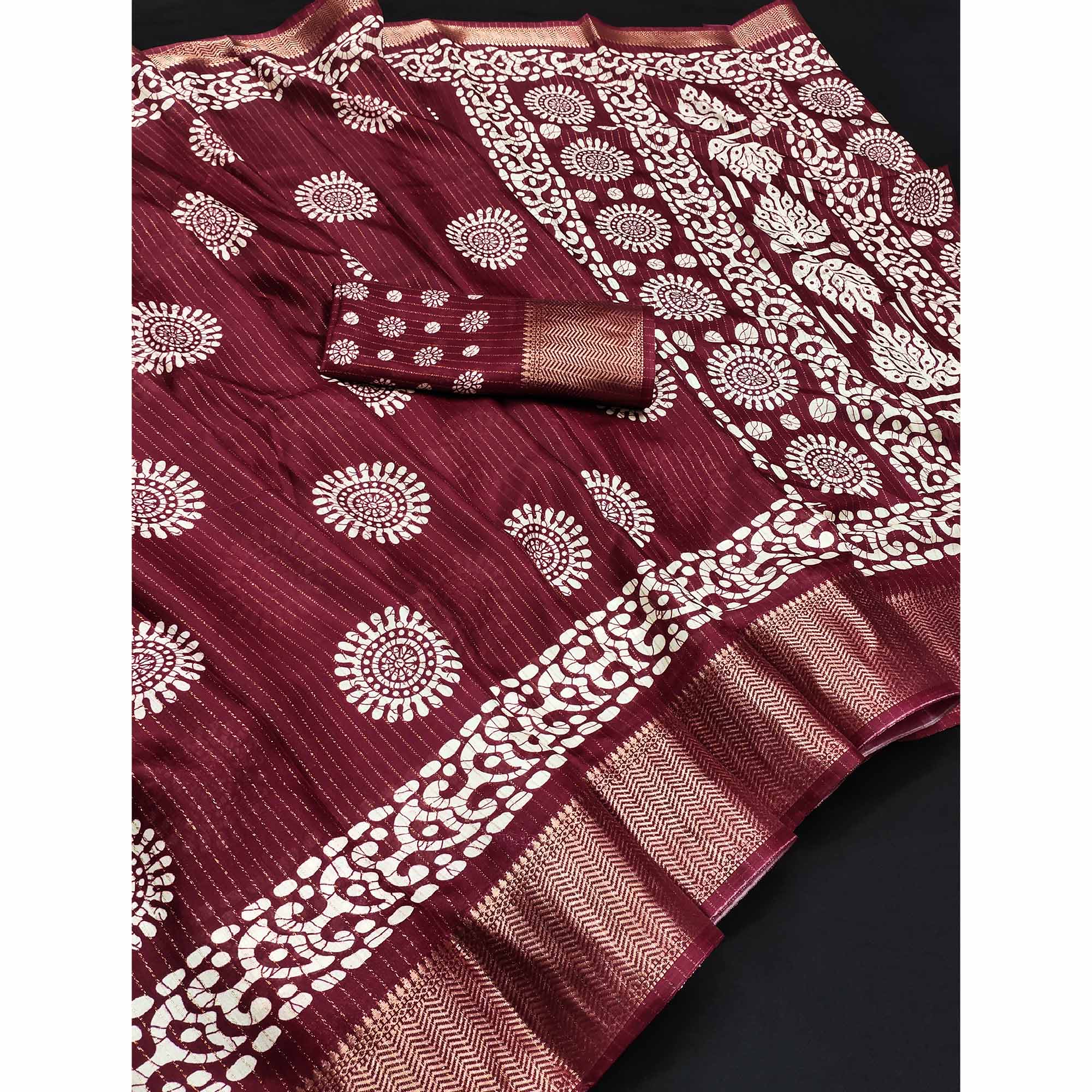 Classic Maroon Dola Silk Saree Adorned with Floral Motifs & Rich Zari Work