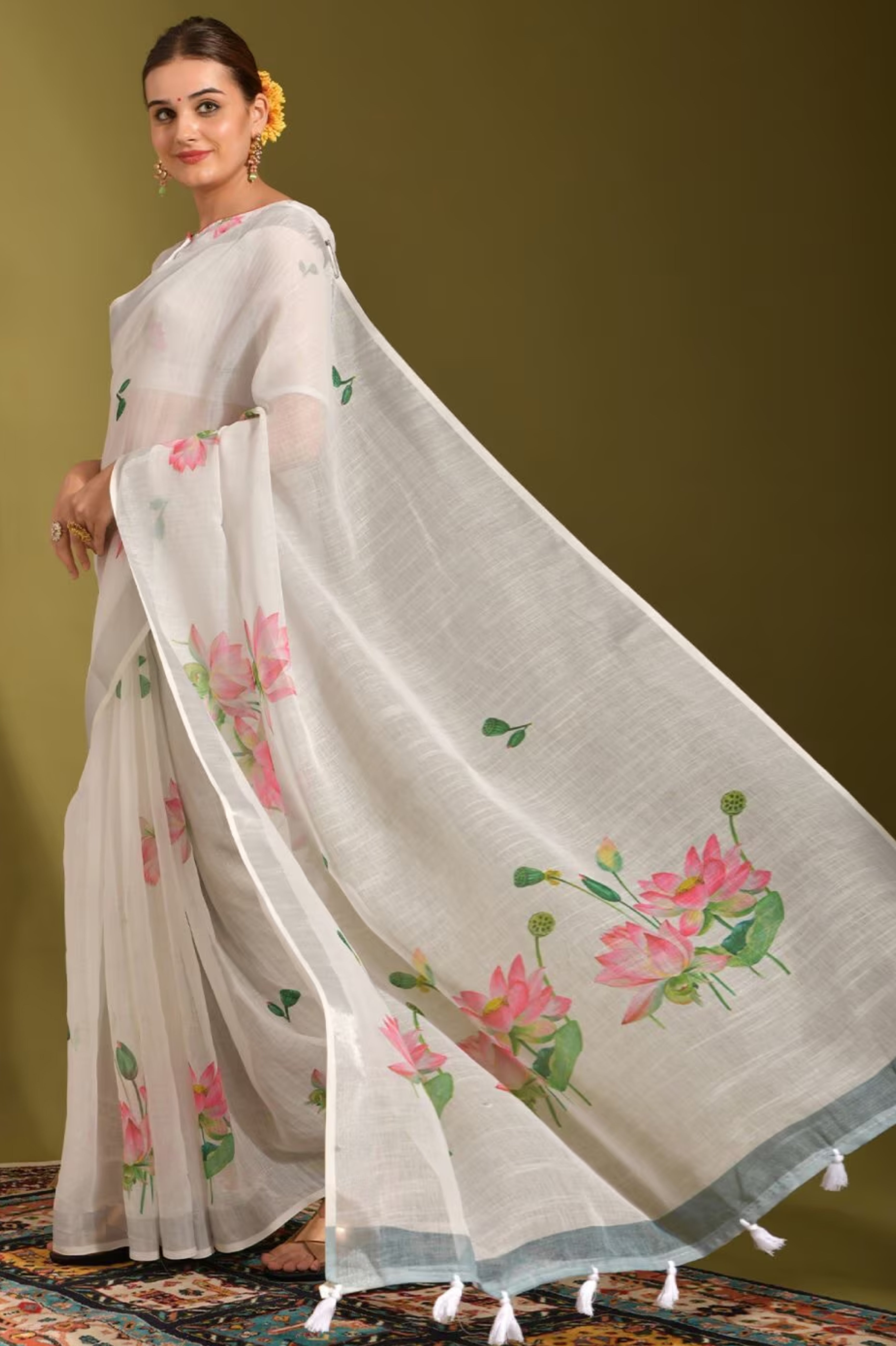 Ethereal White Linen Saree with Floral Print & Tassel Detail