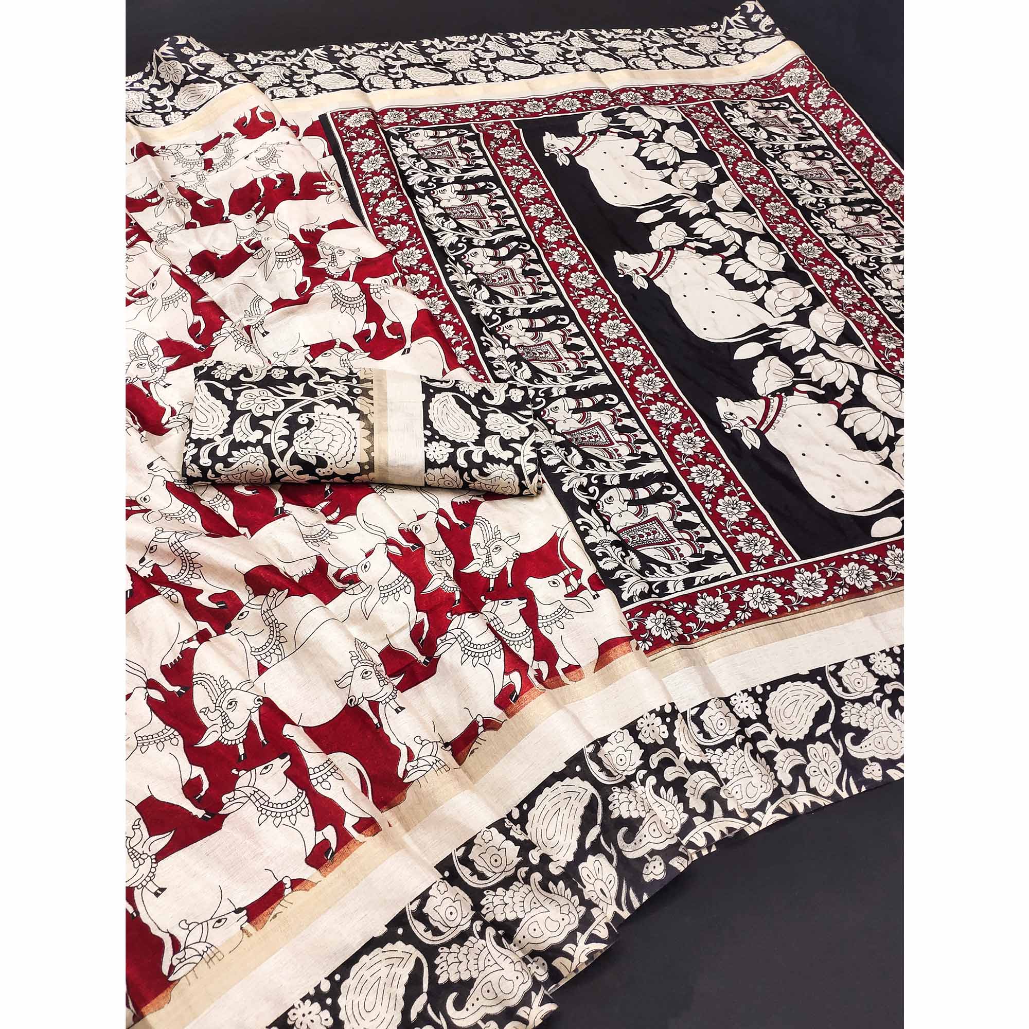 Red & Black Cotton Blend Saree Featuring Artistic Animal And Floral Print Fusion