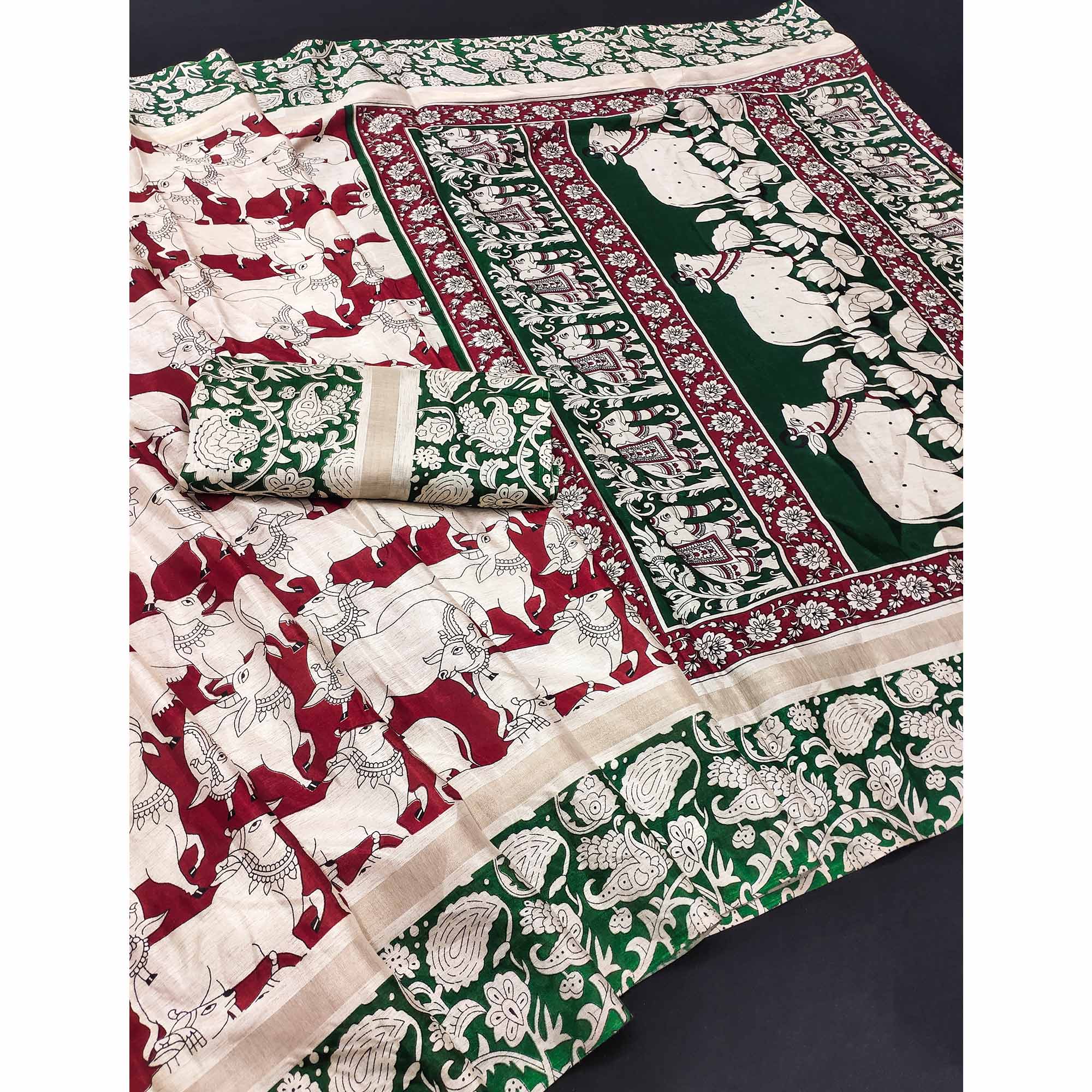 Red & Green Cotton Blend Saree Featuring Artistic Animal And Floral Print Fusion