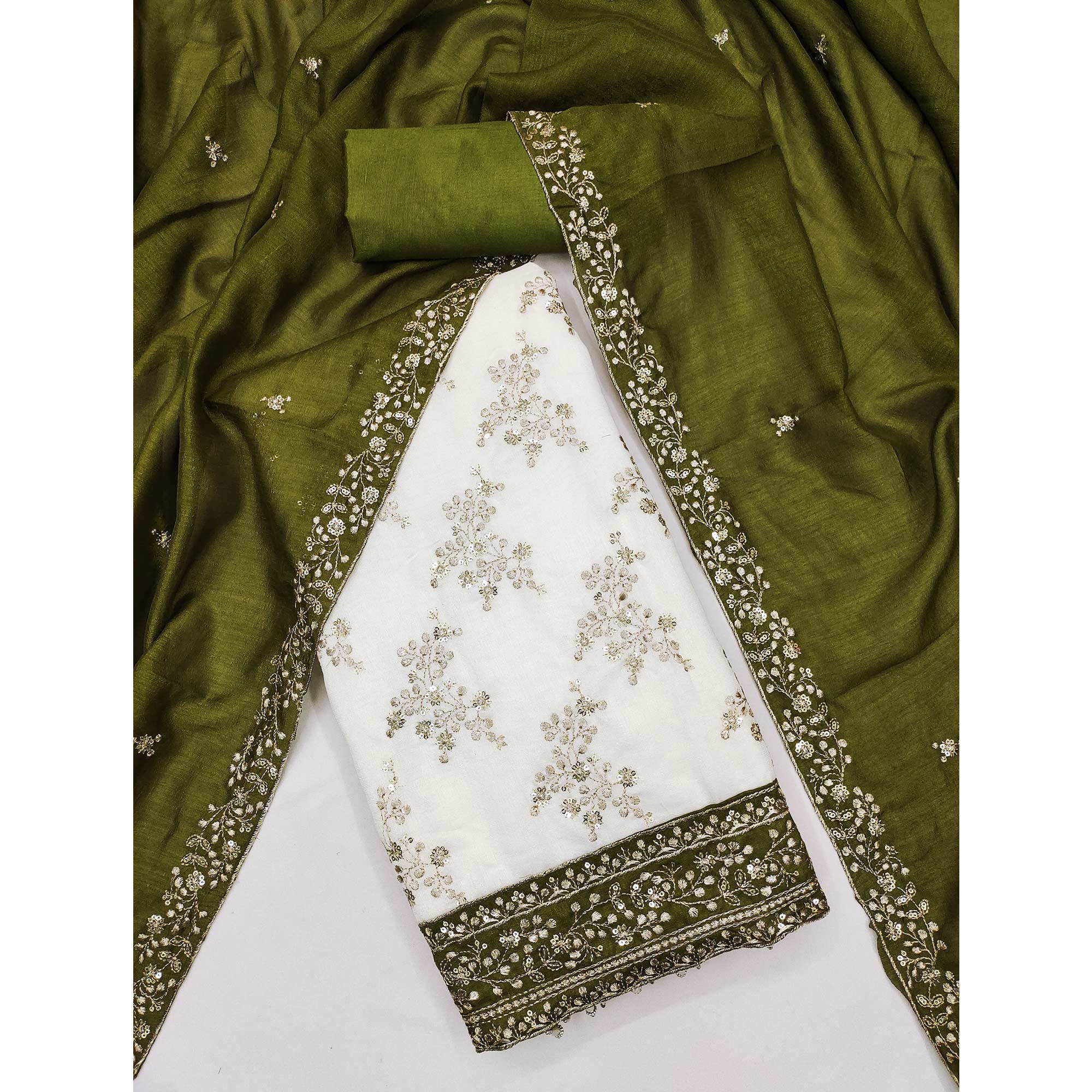 Green and Off White Vichitra Silk Fabric with Embroidered Detailing