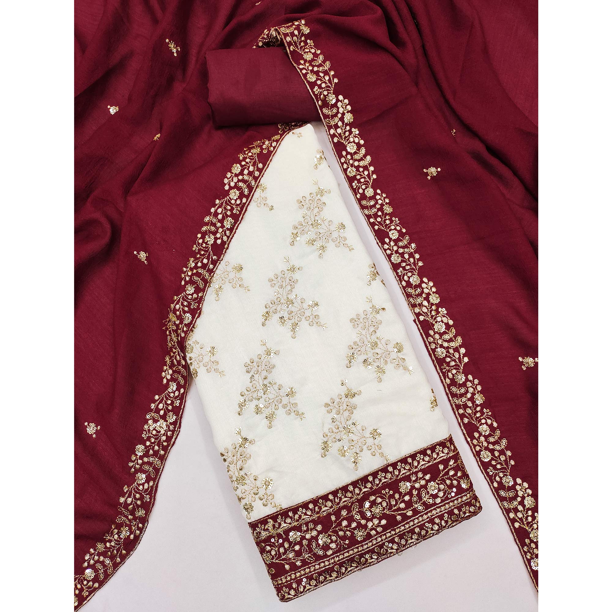 Maroon and Off White Vichitra Silk Fabric with Embroidered Detailing