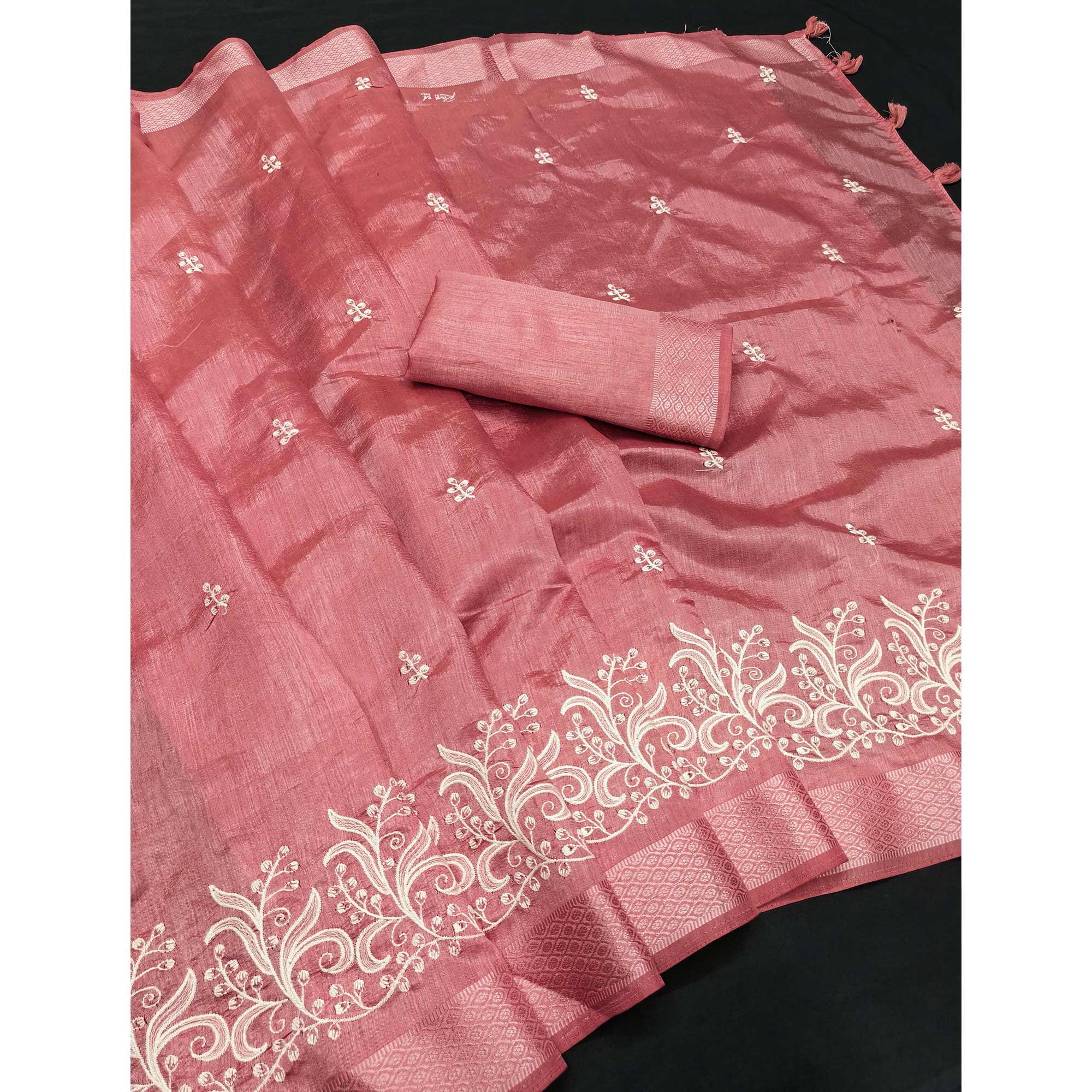 Peach Art Silk Saree Adorned With Delicate Floral Embroidery & Stylish Tassel Pallu