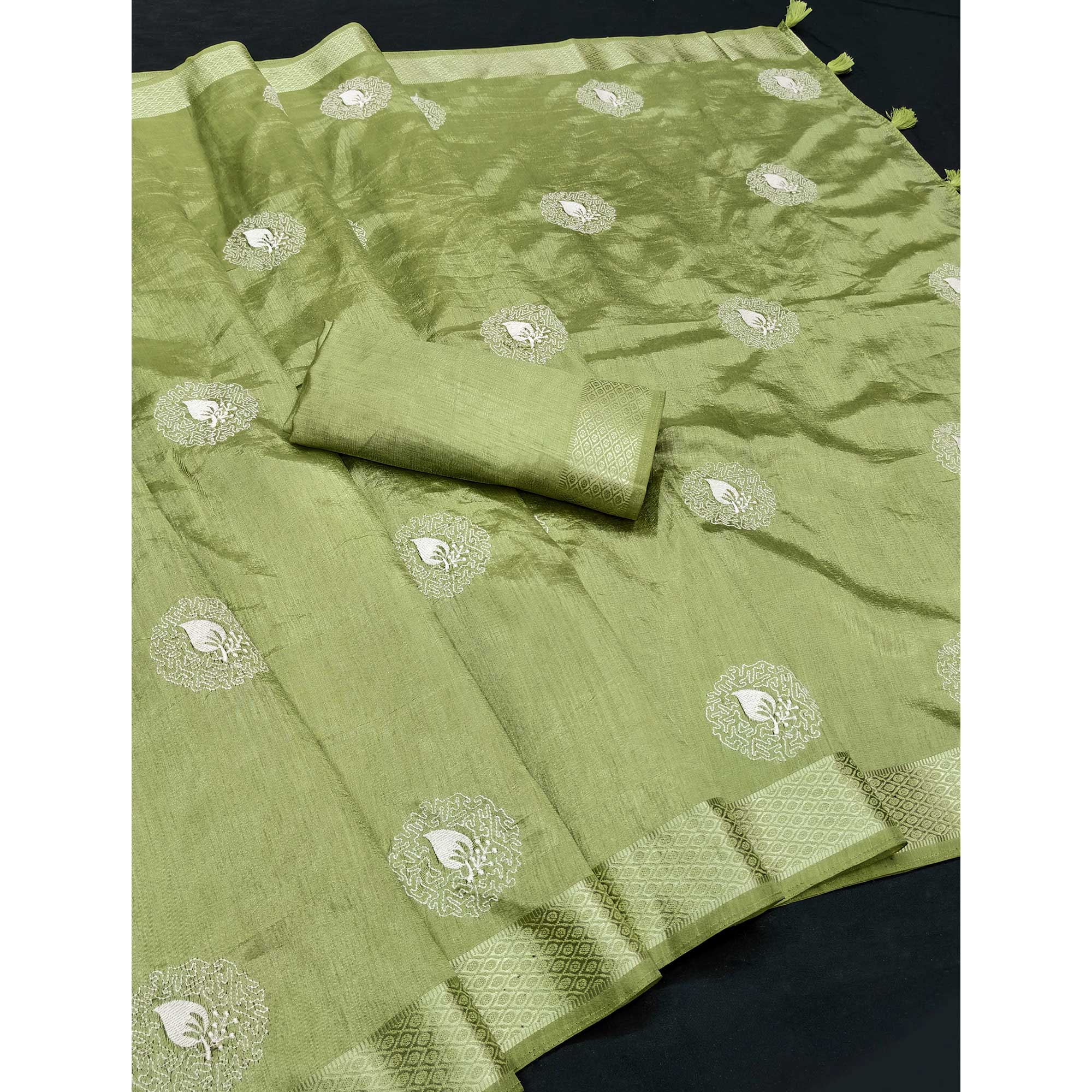 Pista Green Embroidered Art Silk Saree Adorned with Classic Zari Weaving Details