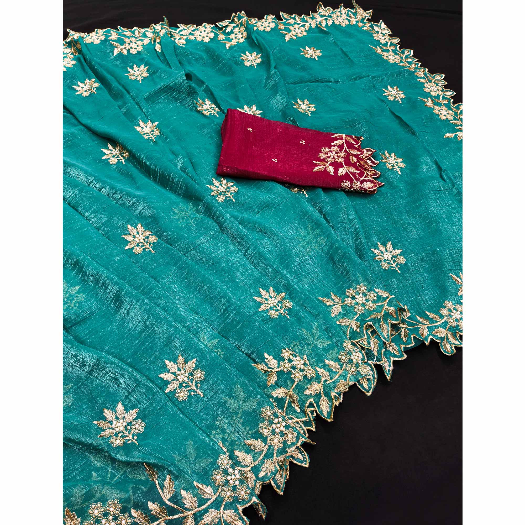 Regal Turquoise Chiffon Saree Adorned with Intricate Golden Embroidery