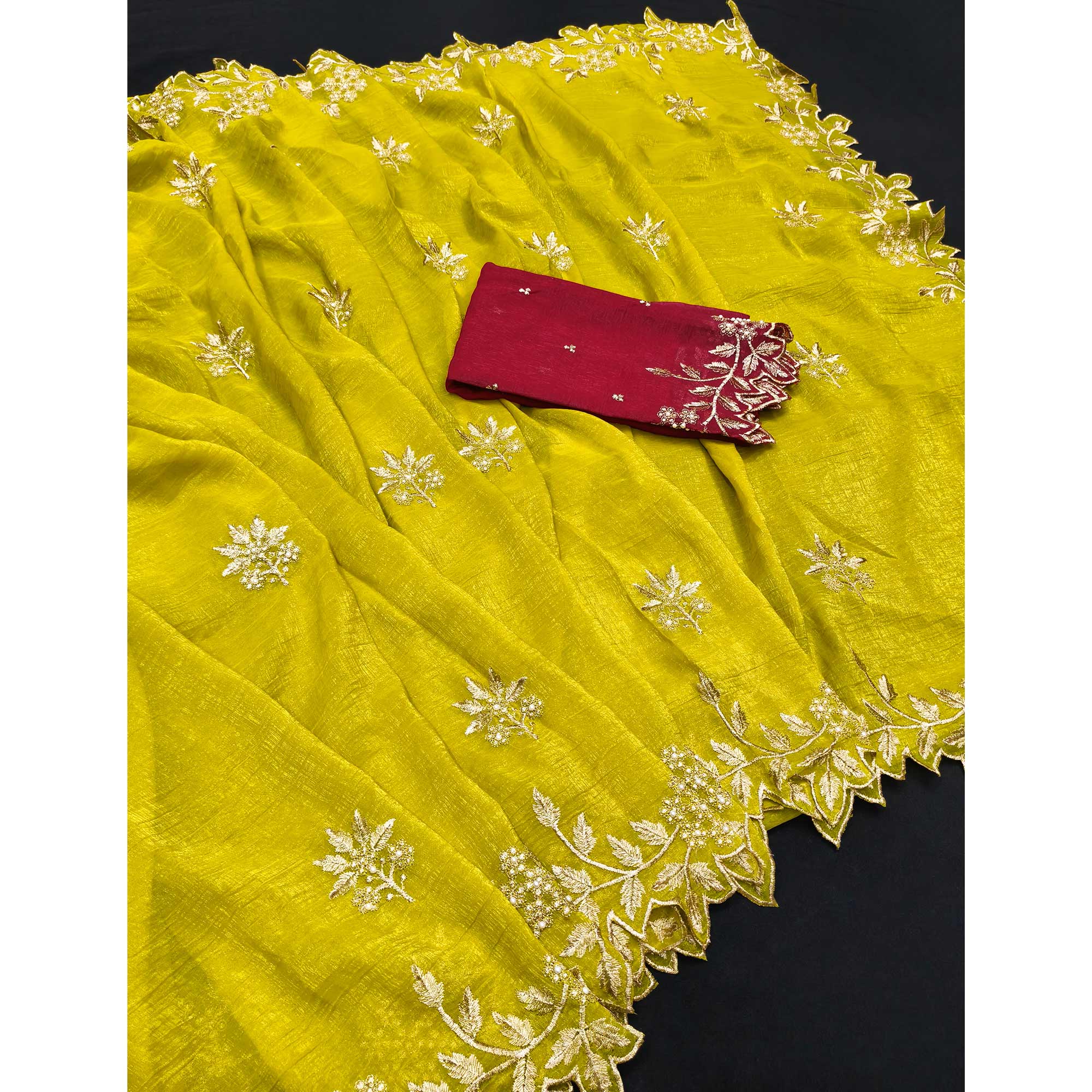 Regal Yellow Chiffon Saree Adorned with Intricate Golden Embroidery