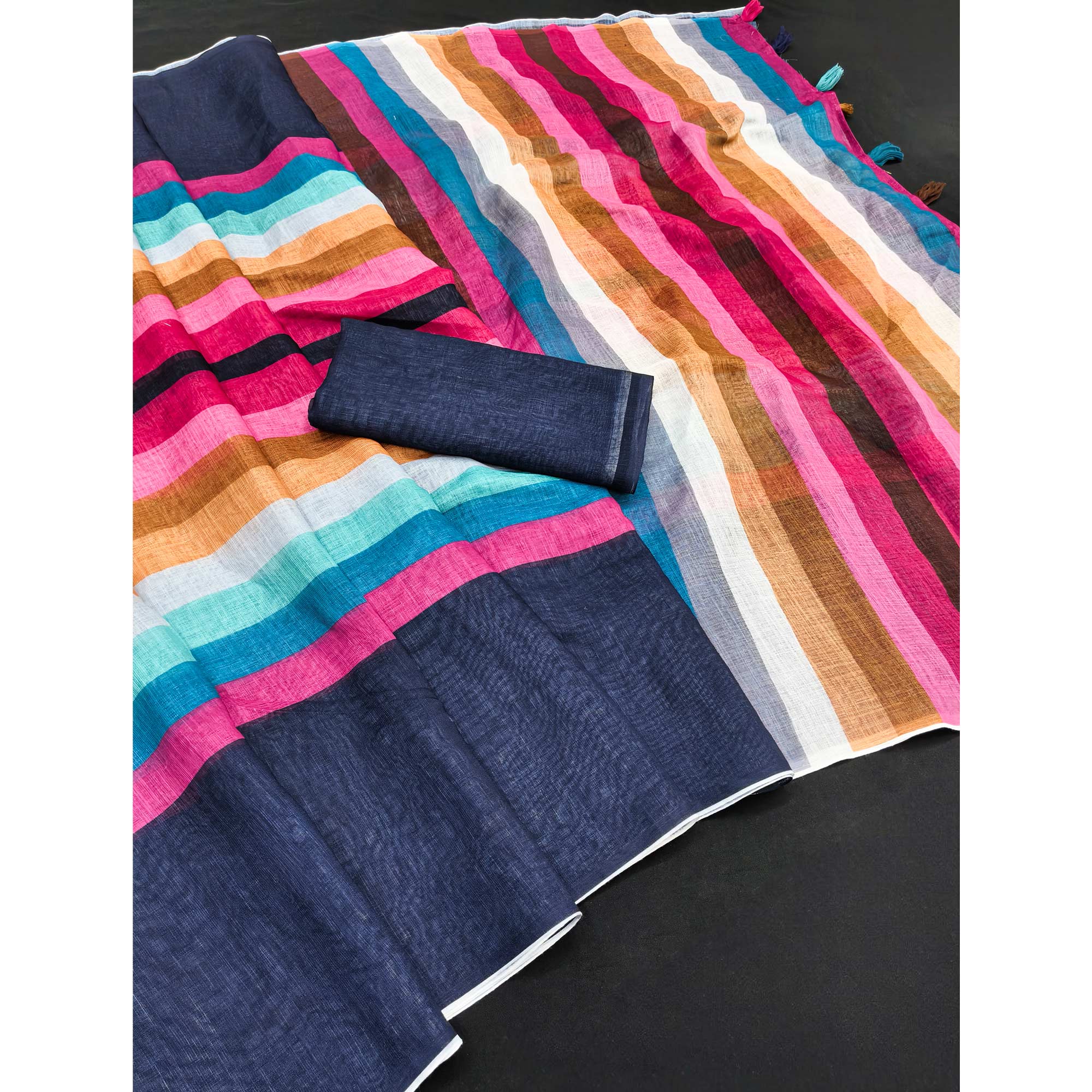 Navy Blue Linen Saree Designed with Modern Striped Prints and Trendy Tassel Detailing